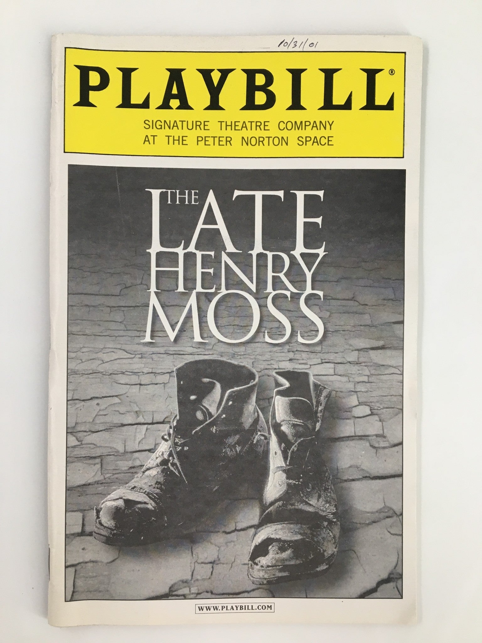 2001 Playbill for The Late Henry Moss featuring the Signature Theatre Company, showcasing a striking image of worn boots on a cracked surface.