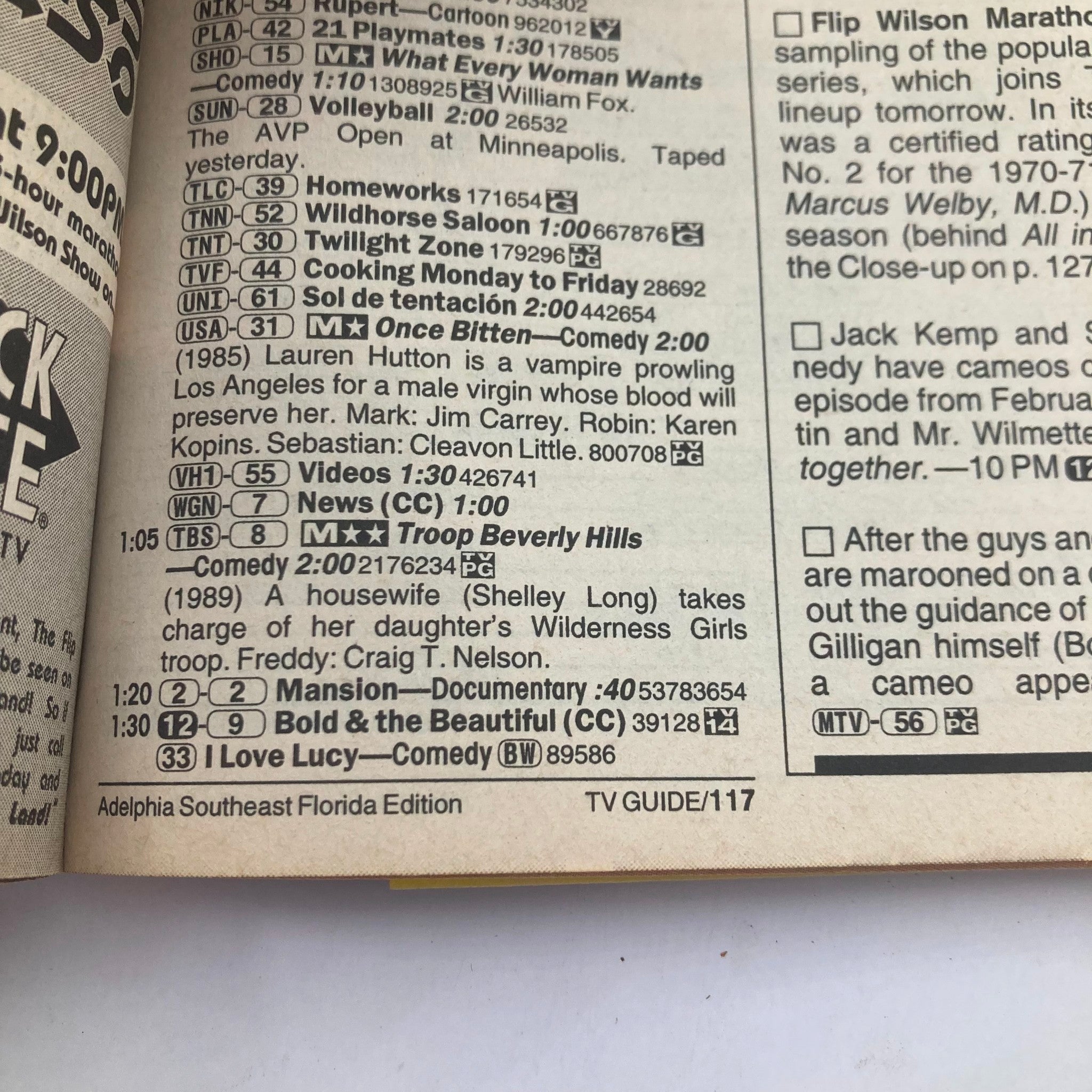 Interior page of TV Guide Magazine from August 16, 1997 displaying television listings and program details. This edition includes classic shows and movies from the late 20th century, adding to the nostalgia of Elvis Presley fans.