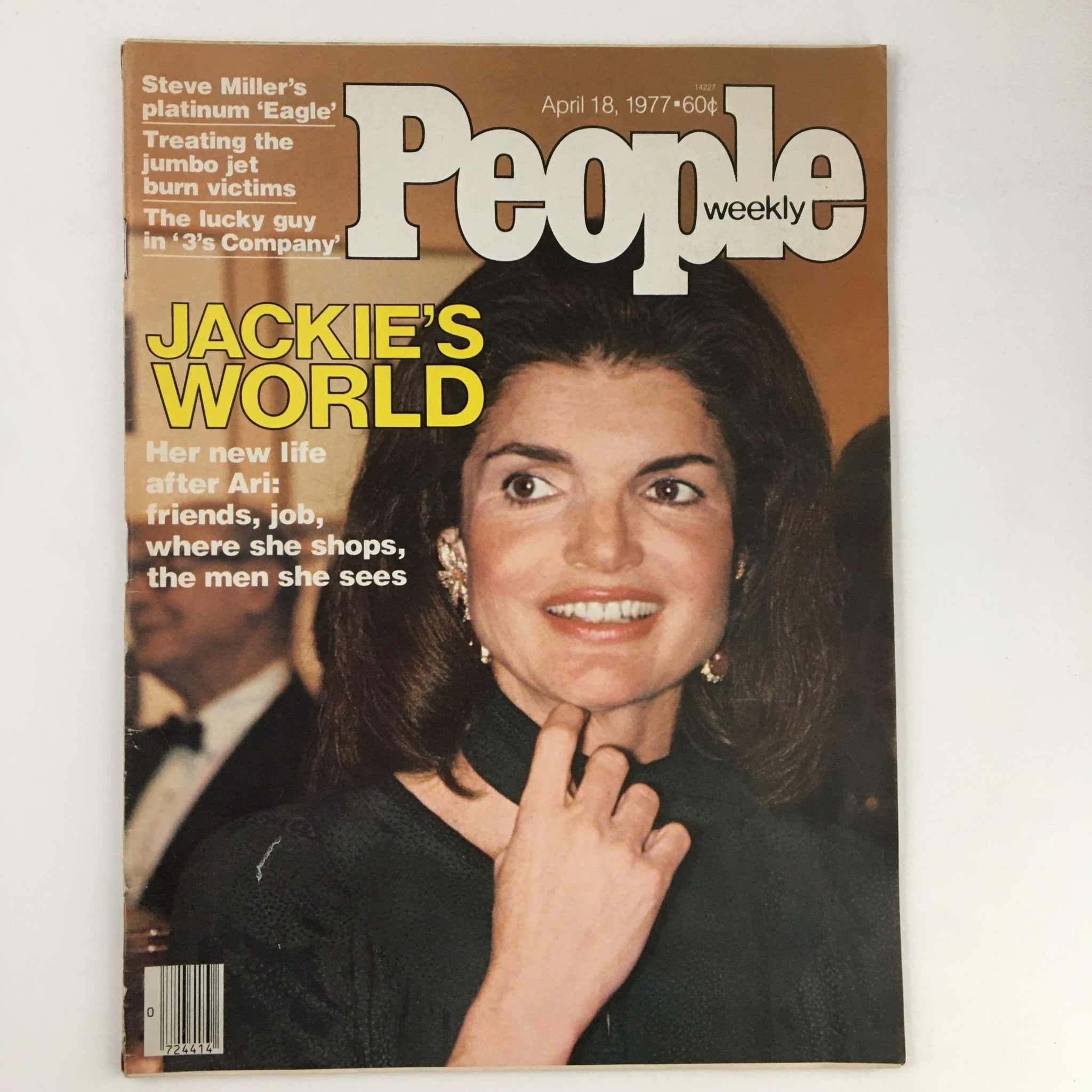 Cover of People Weekly Magazine from April 18, 1977 featuring 'Jackie's World', highlighting Jackie Onassis with a captivating smile, showcasing her influential role in society.