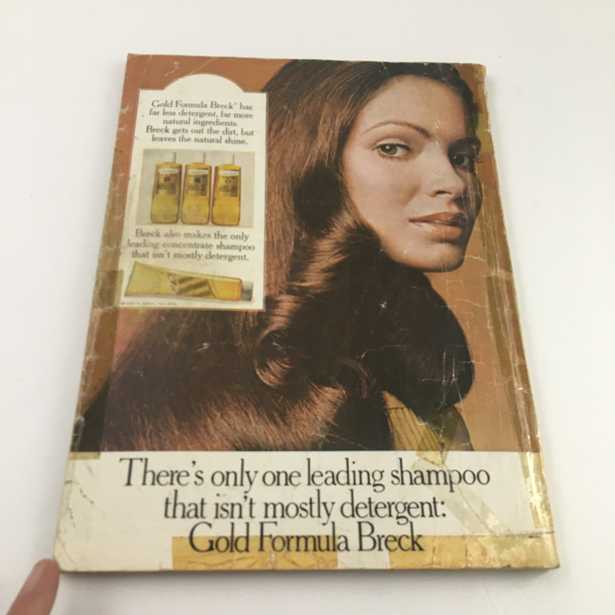 Cover of Good Housekeeping Magazine October 1972 highlighting a vintage advertisement for Gold Formula Breck shampoo, showcasing its unique qualities and the model's glossy hair.