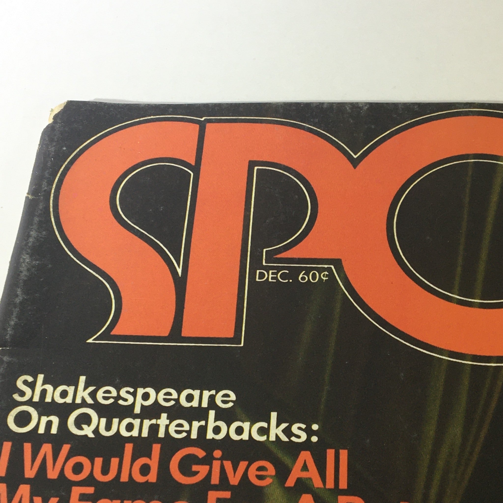 Close-up of the Sport Magazine December 1973 title and headline, showcasing the vintage design and reference to Shakespeare on quarterbacks.