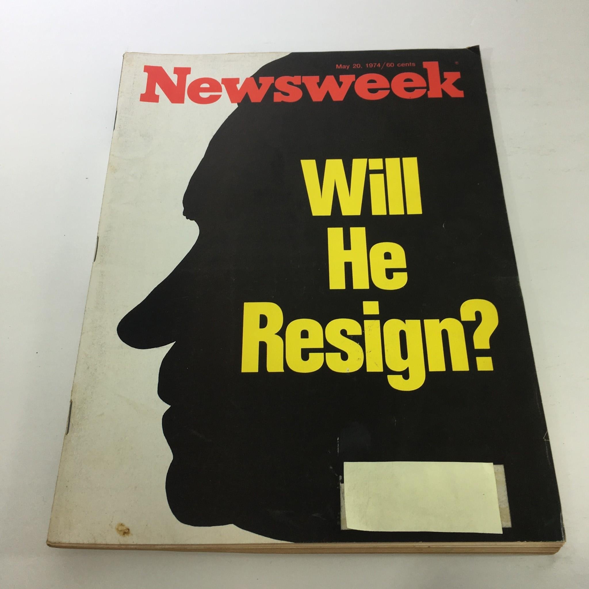 Cover of Newsweek Magazine dated May 20, 1974, featuring the title 'Will He Resign?' in bold yellow text against a black background, highlighting Richard Nixon's profile silhouette.