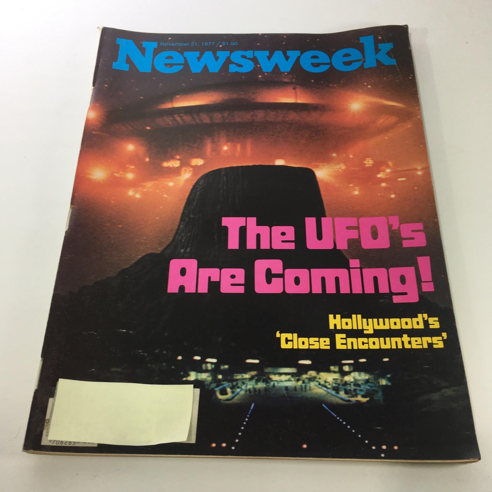 Inside pages of the vintage Newsweek magazine from November 21, 1977, showcasing articles related to Hollywood's 'Close Encounters' and the cultural impact of sci-fi cinema.