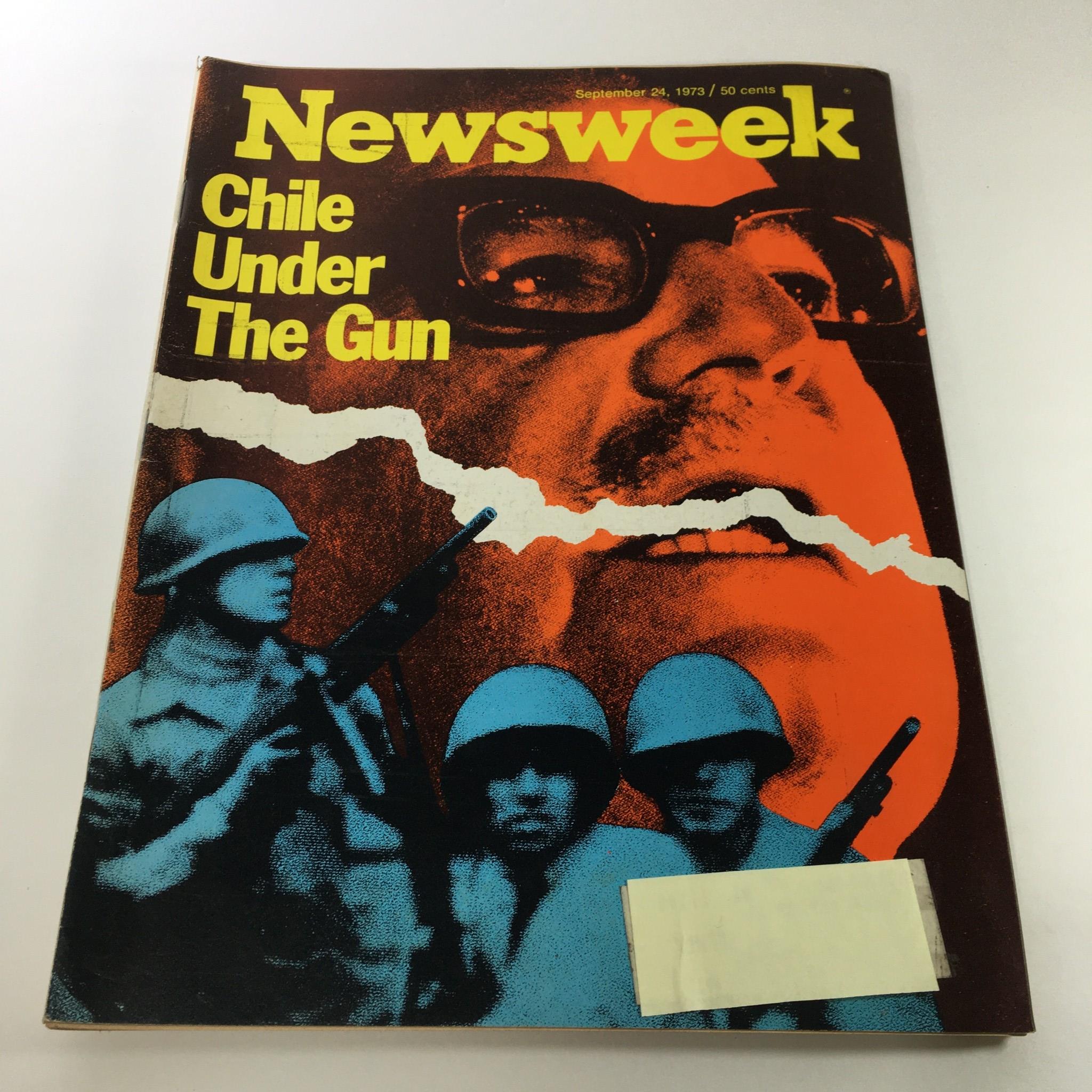 Cover of VTG Newsweek Magazine from September 24, 1973, titled 'Chile Under The Gun'. Features an illustration of soldiers and a dramatic face, symbolizing the socio-political turmoil in Chile during that era.