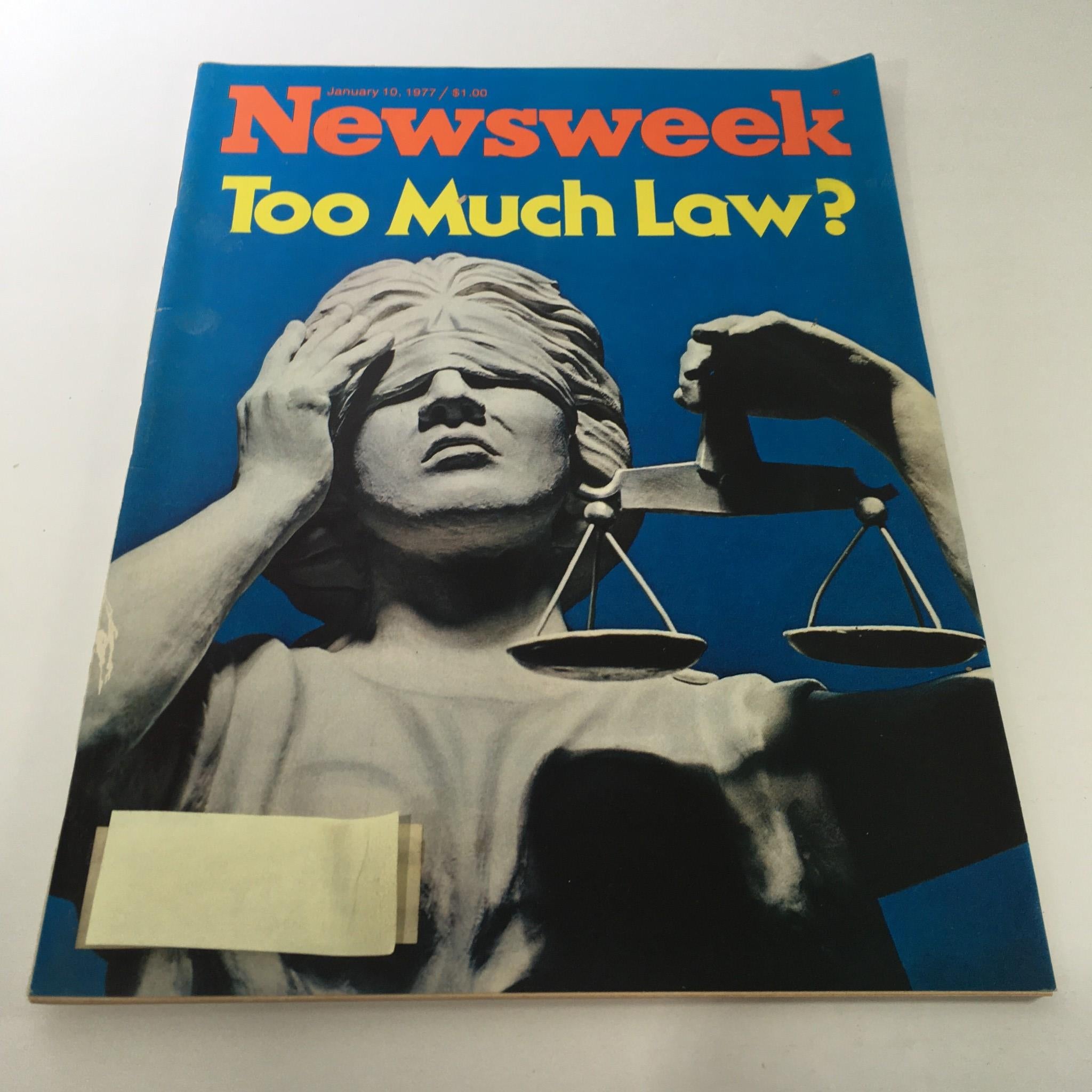 Vintage Newsweek magazine from January 10, 1977, featuring the cover story 'Too Much Law?' with an image of a statue representing justice.