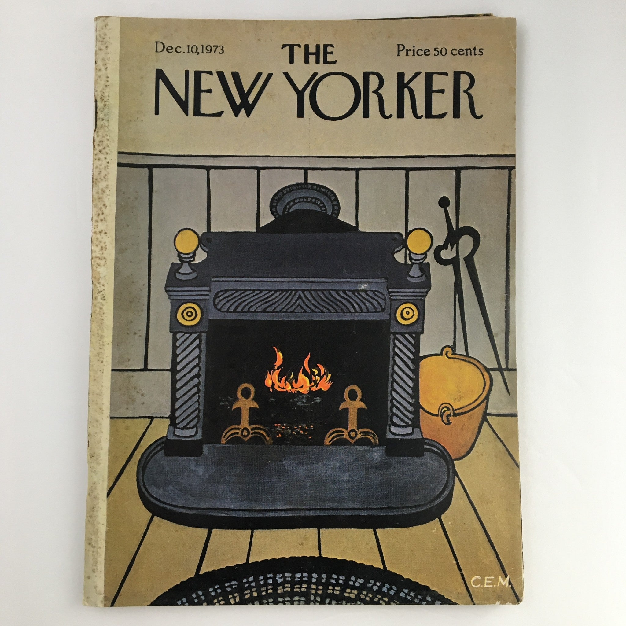 Cover of The New Yorker Magazine from December 10, 1973, featuring a fireplace illustration by Charles E. Martin, depicting a cozy winter scene.