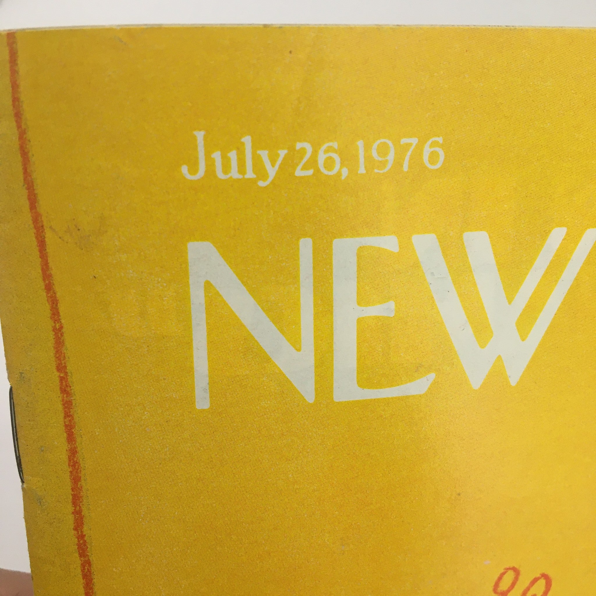 Close-up image of The New Yorker Magazine July 26 1976 cover showing the date and magazine title in bold letters against a yellow background.