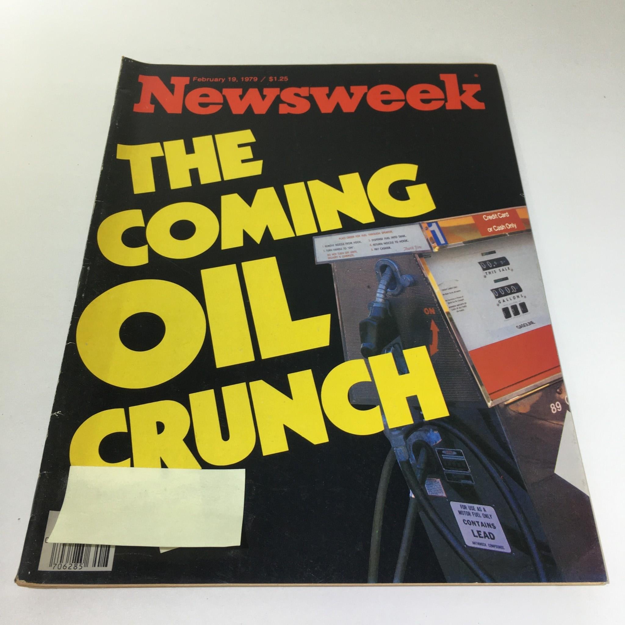 Cover of Newsweek Magazine from February 19, 1979, featuring bold yellow text that reads 'The Coming Oil Crunch.' The cover highlights concerns about the 1979 oil crisis, showcasing a fuel pump and price indicators.