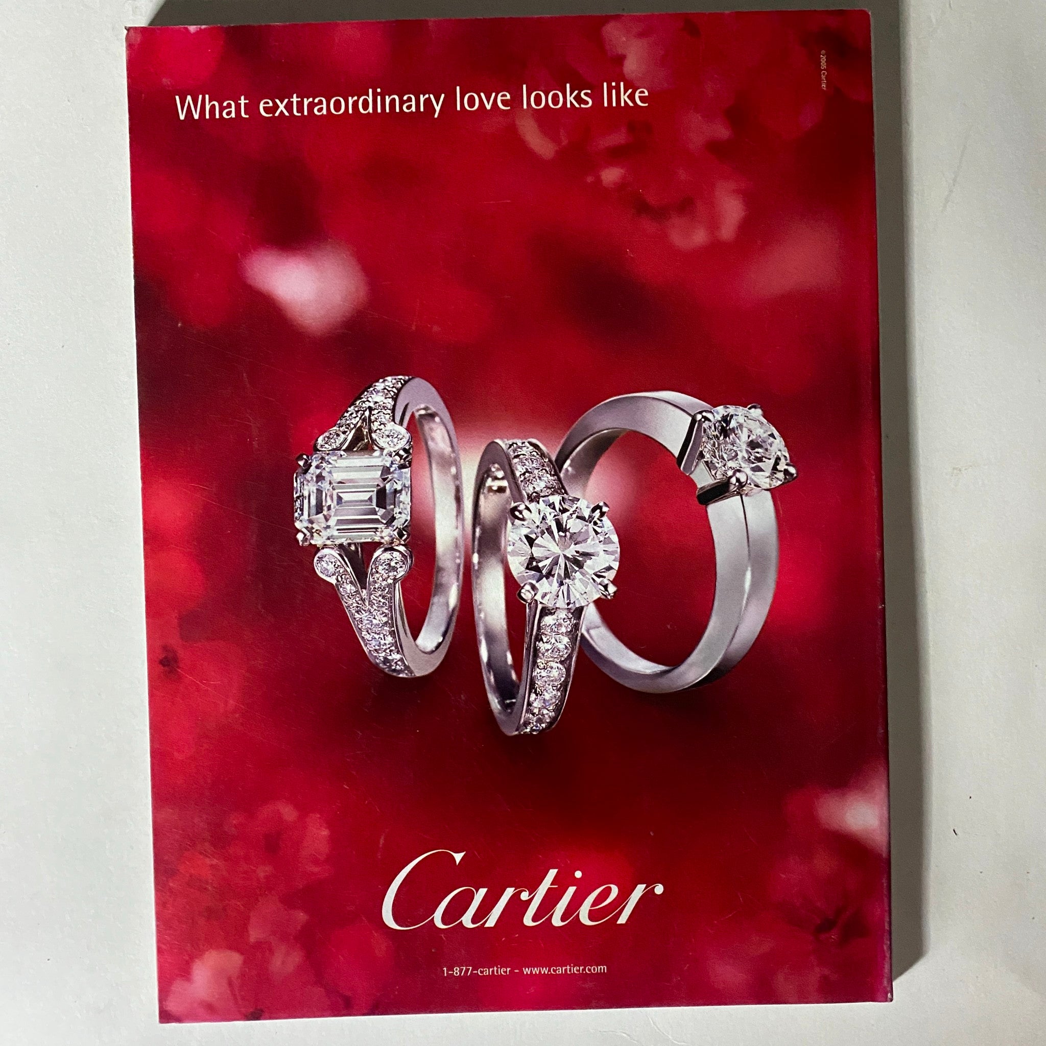 An advertisement from Elle Magazine June 2007 featuring elegant Cartier rings, symbolizing exquisite craftsmanship and luxury in jewelry.