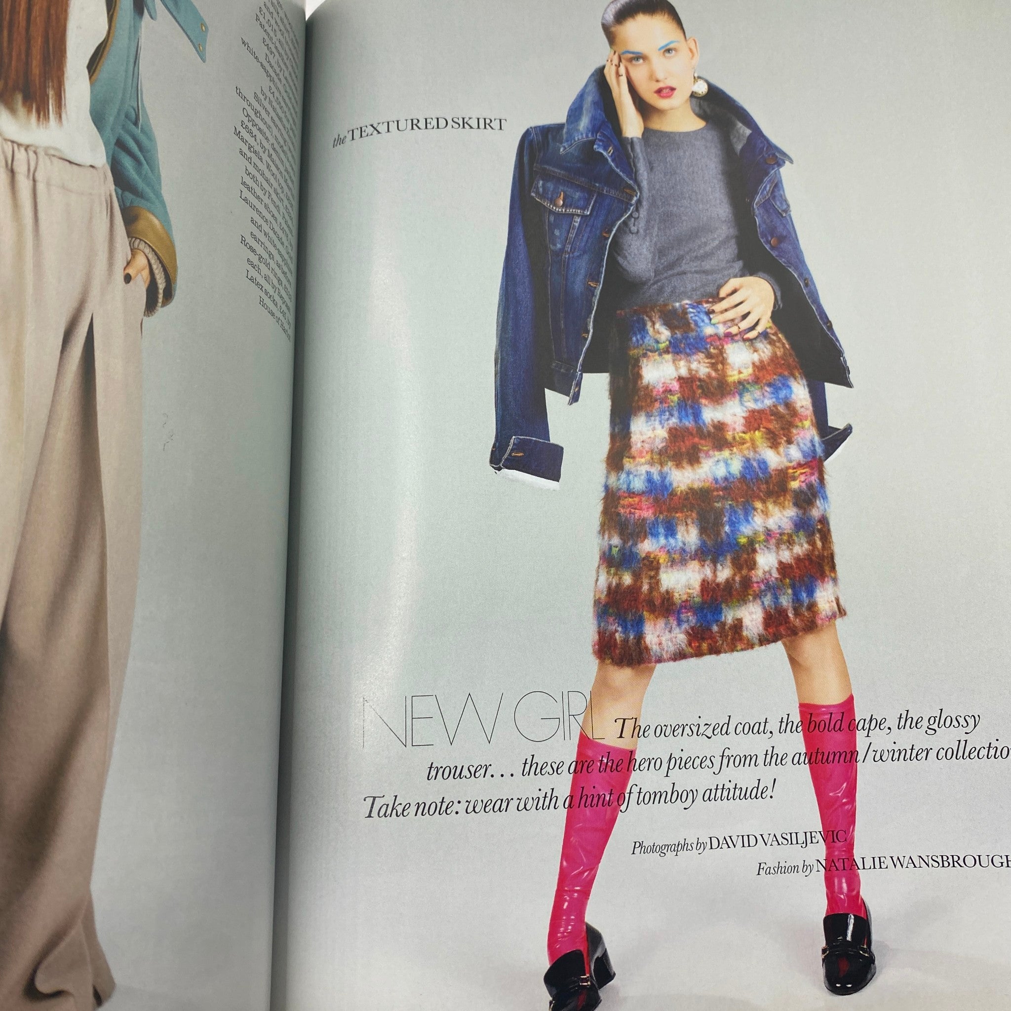 Elle Magazine August 2012 cover featuring a model in a textured skirt styled with a denim jacket, showcasing contemporary fashion trends. Photographed by David Vasiljević, with a focus on bold styling and colorful textures.