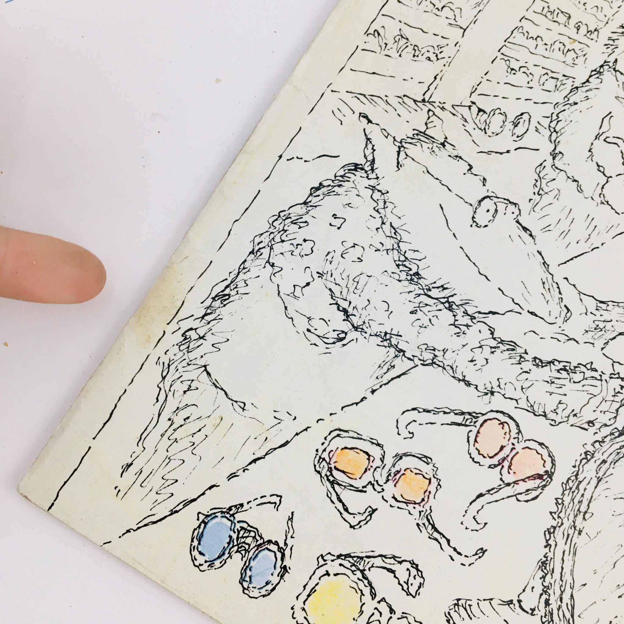 Detail of The New Yorker Magazine July 15, 1974 with theme cover illustrated by Edward Koren, featuring a character and sunglasses.