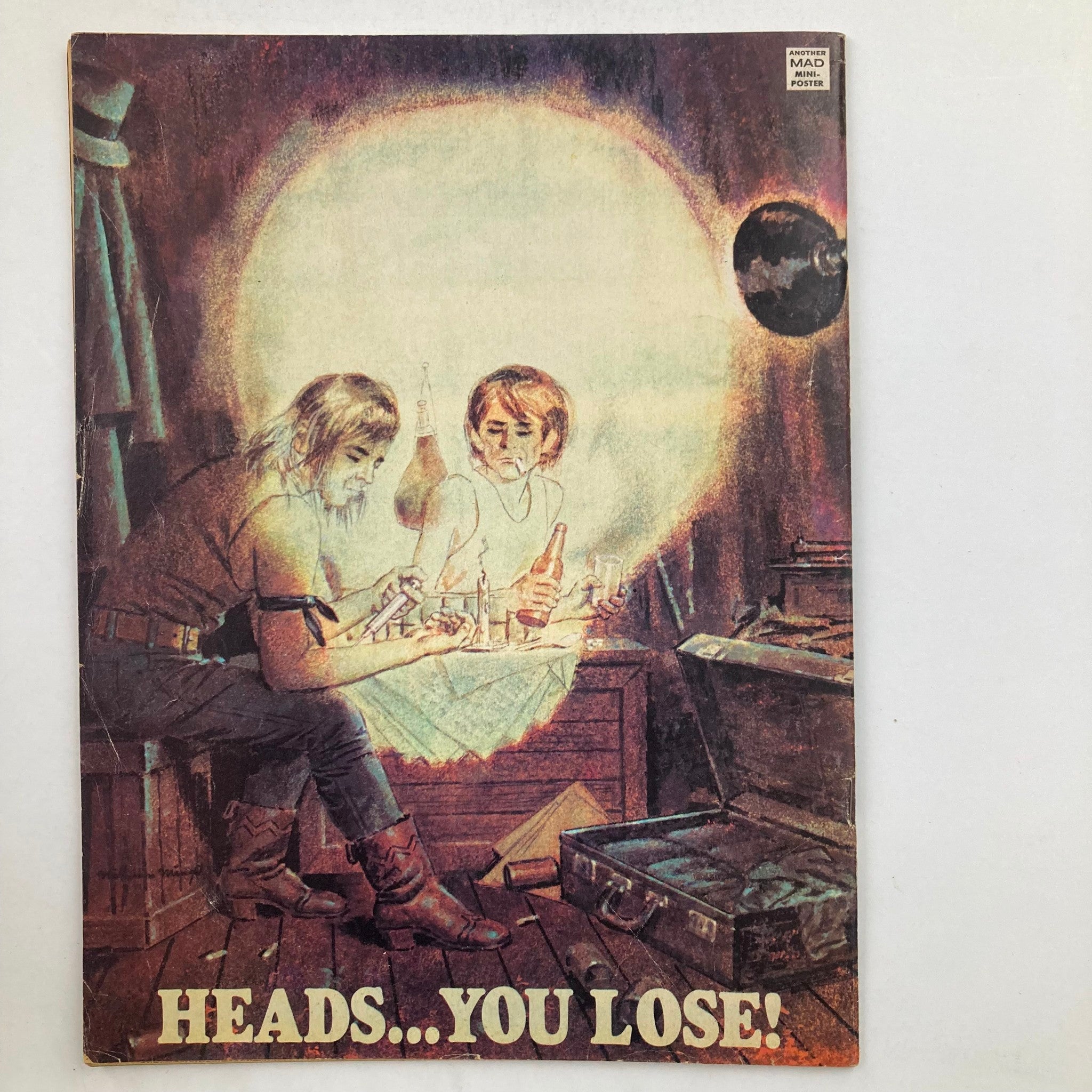 Back cover of Mad Magazine March 1974 No. 165 with a surreal illustration entitled 'Heads... You Lose!', showcasing the magazine's blend of whimsical art and commentary on societal themes.