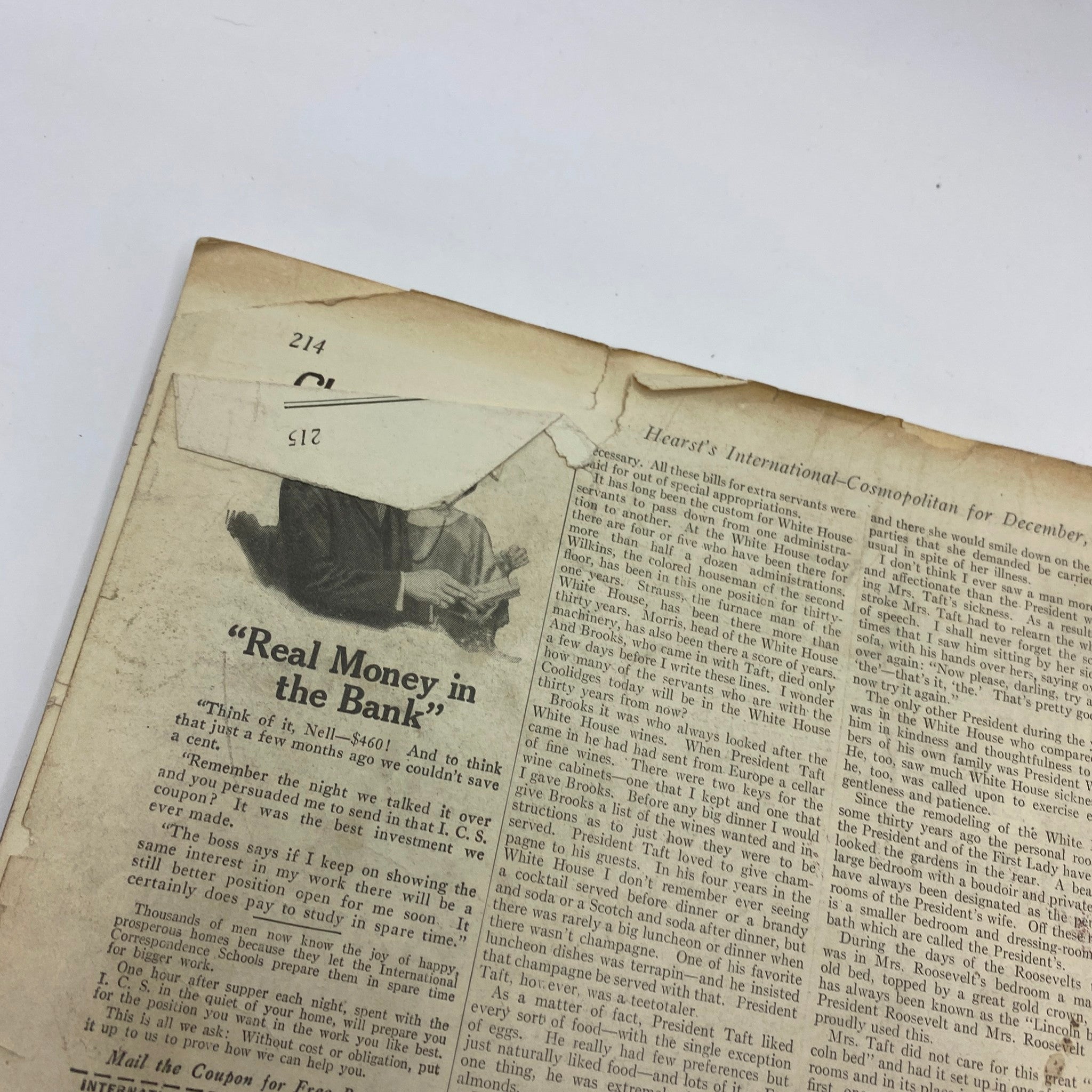 Close-up view of a page from VTG Cosmopolitan Magazine December 1926 highlighting an article about financial advice titled 'Real Money in the Bank' with visible wear.