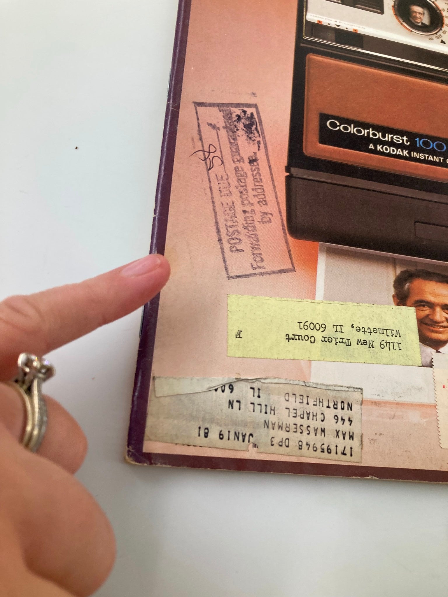 Close-up view of the cover of Forbes Magazine, dated September 3, 1979, highlighting details such as postal labels and markings that add character to this vintage collectible featuring the Kodak Colorburst 100 camera.