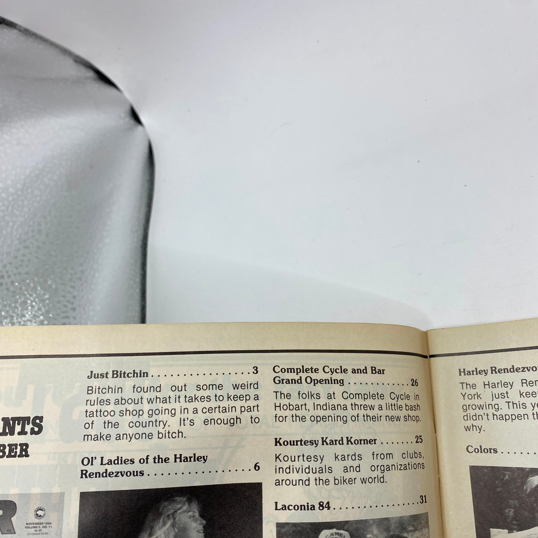 Interior page of VTG Biker Lifestyle Magazine November 1984, showcasing the table of contents with sections highlighted, including 'Ol' Ladies of the Harley Rendezvous' and 'Laconia 84'.