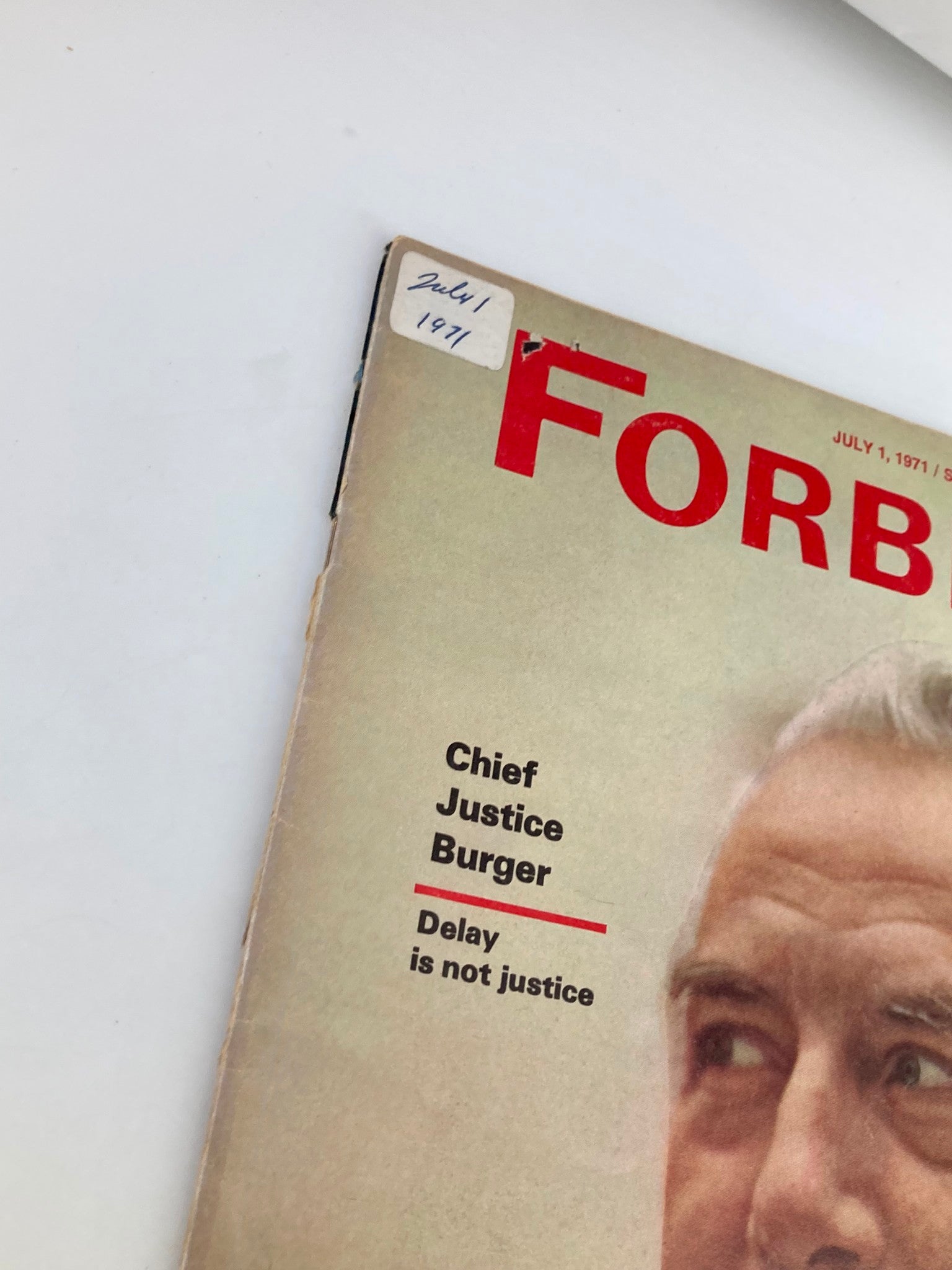 Close-up view of the Forbes Magazine cover dated July 1, 1971, highlighting the title 'Chief Justice Burger: Delay is not justice.' An important historical artifact for collectors.