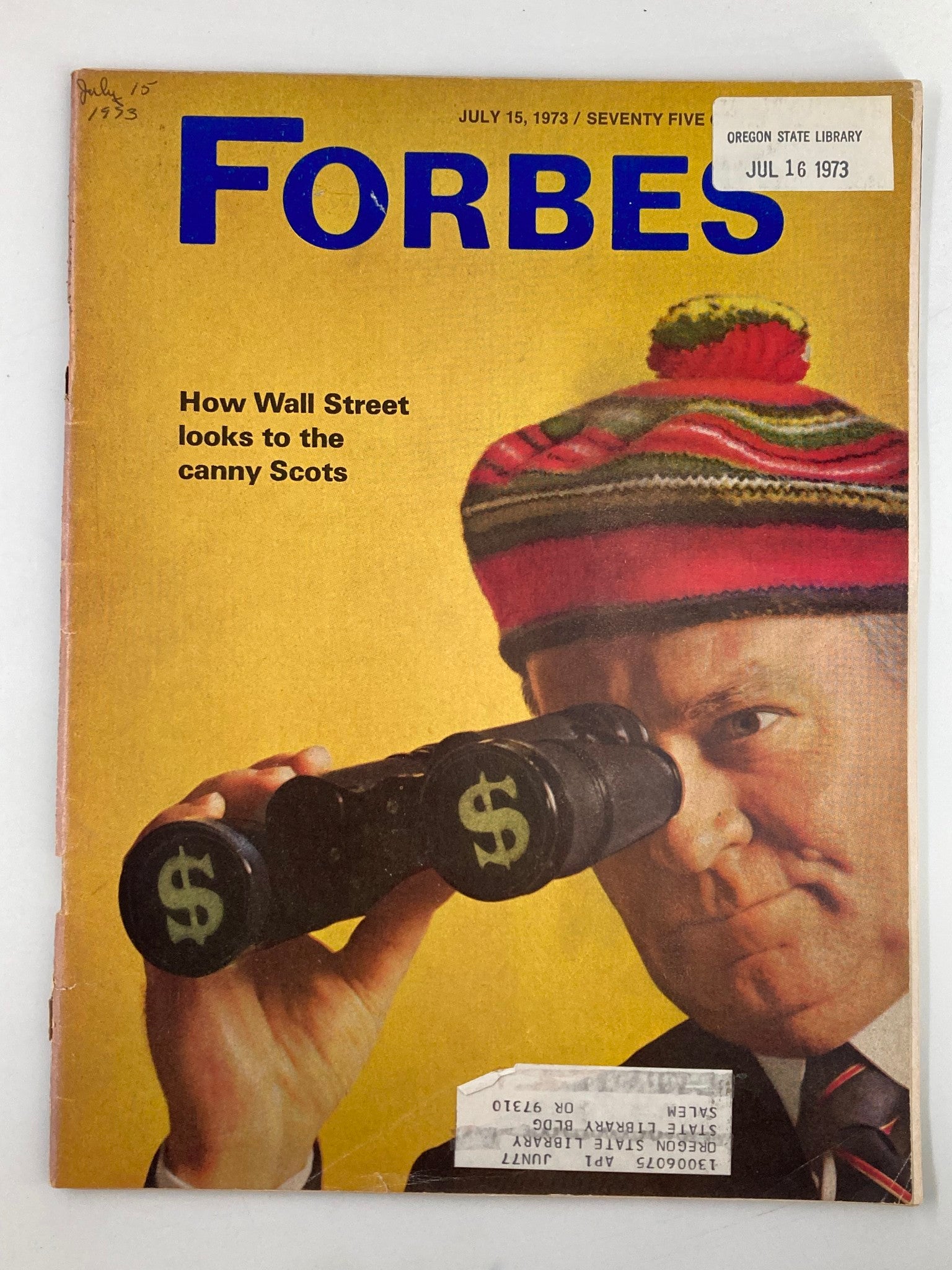 Vintage Forbes Magazine cover from July 15, 1973, featuring an article titled 'How Wall Street Looks to the Canny Scotts'. The cover depicts a man looking through binoculars with dollar signs, showcasing a blend of economic analysis and cultural commentary from the 1970s.