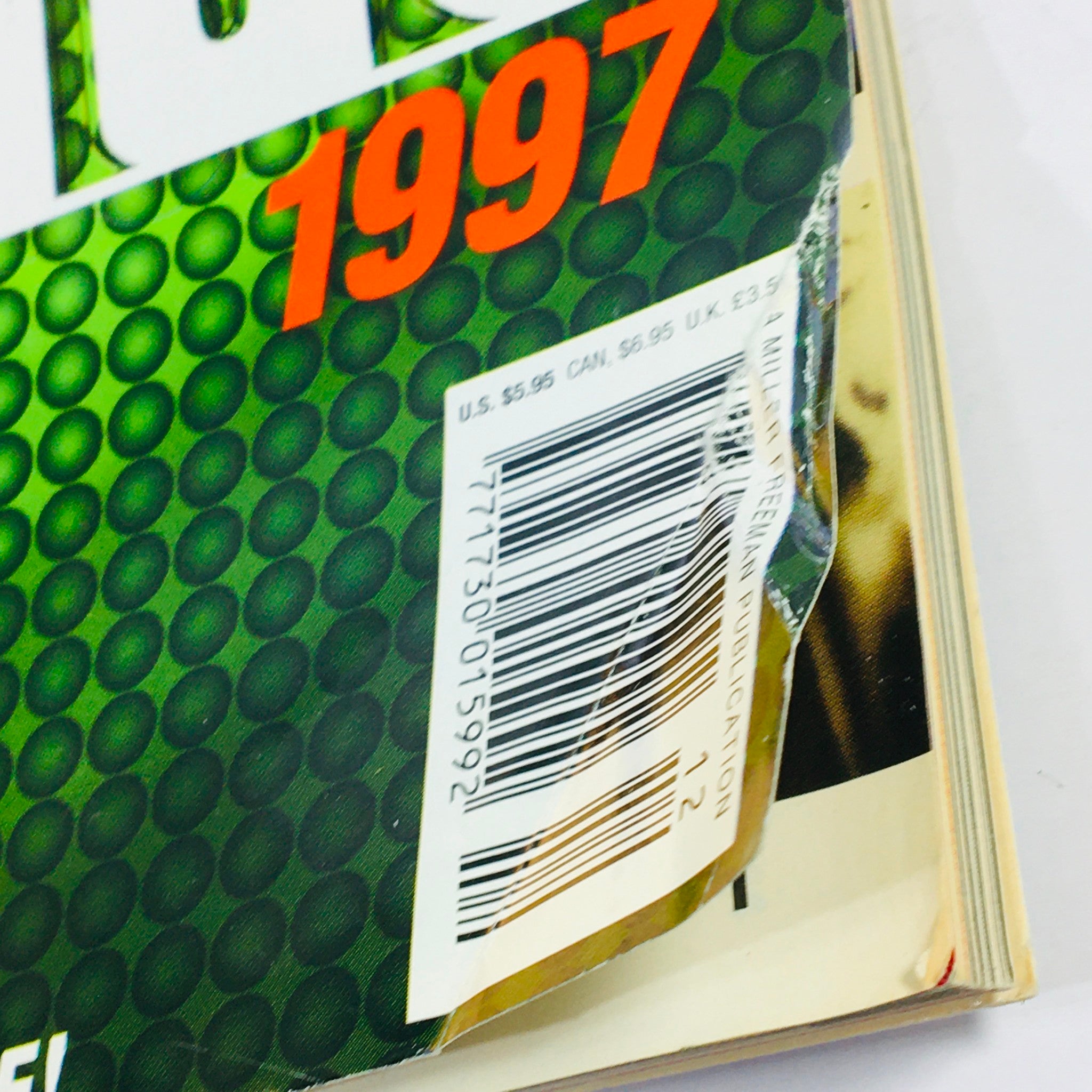 Close-up of the corner of Keyboard Magazine December 1996, displaying minor wear and tear, including a barcode and publication details.