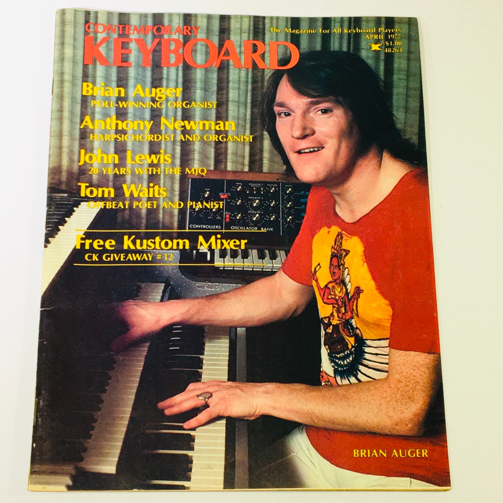 Vintage Keyboard Magazine from April 1977 featuring Brian Auger, Anthony Newman, and John Lewis on the cover, showcasing rich keyboard music history and notable artists of the time.