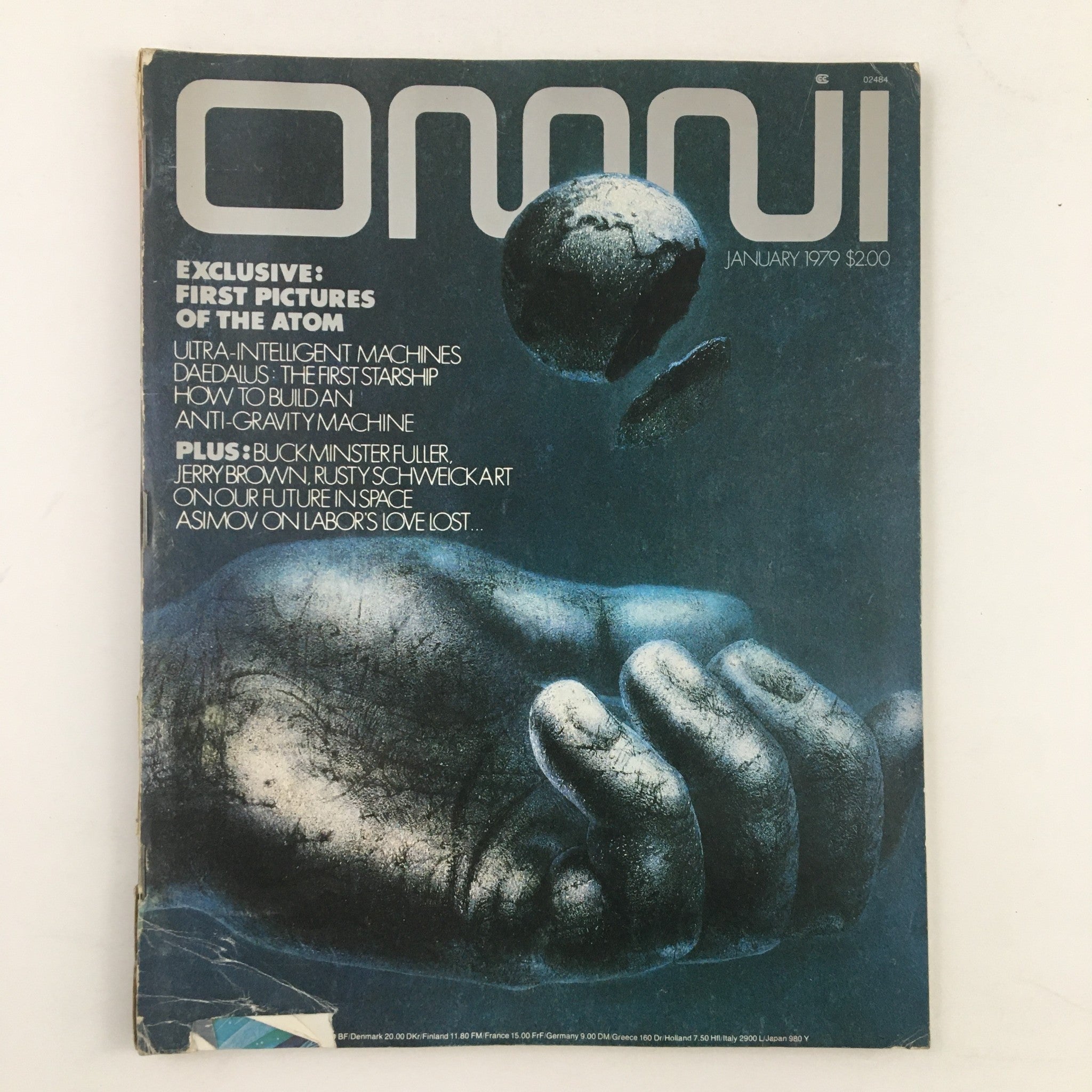 Omni Magazine January 1979 cover featuring the title 'First Pictures of the Atom' alongside articles on ultra-intelligent machines and Daedalus, showcasing an artistic representation of a hand holding a celestial object.