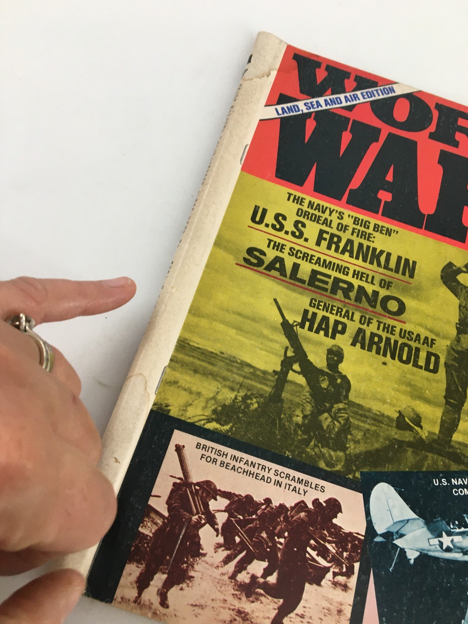 Side view of the cover from 'VTG World War II Magazine July 1975 USS Franklin in Agony of Fire No Label', showcasing the title and details of the magazine.