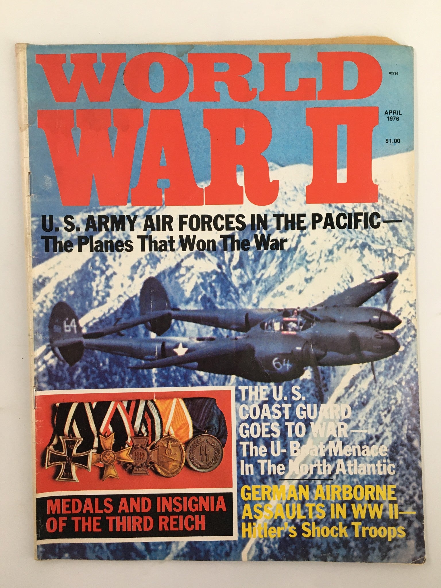 Cover of VTG World War II Magazine April 1976 featuring U.S. Army Air Forces in the Pacific, showcasing a military aircraft above mountainous terrain, highlighting articles on planes that won the war, and includes artwork of medals and insignia of the Third Reich, reflecting historical significance of military aviation.