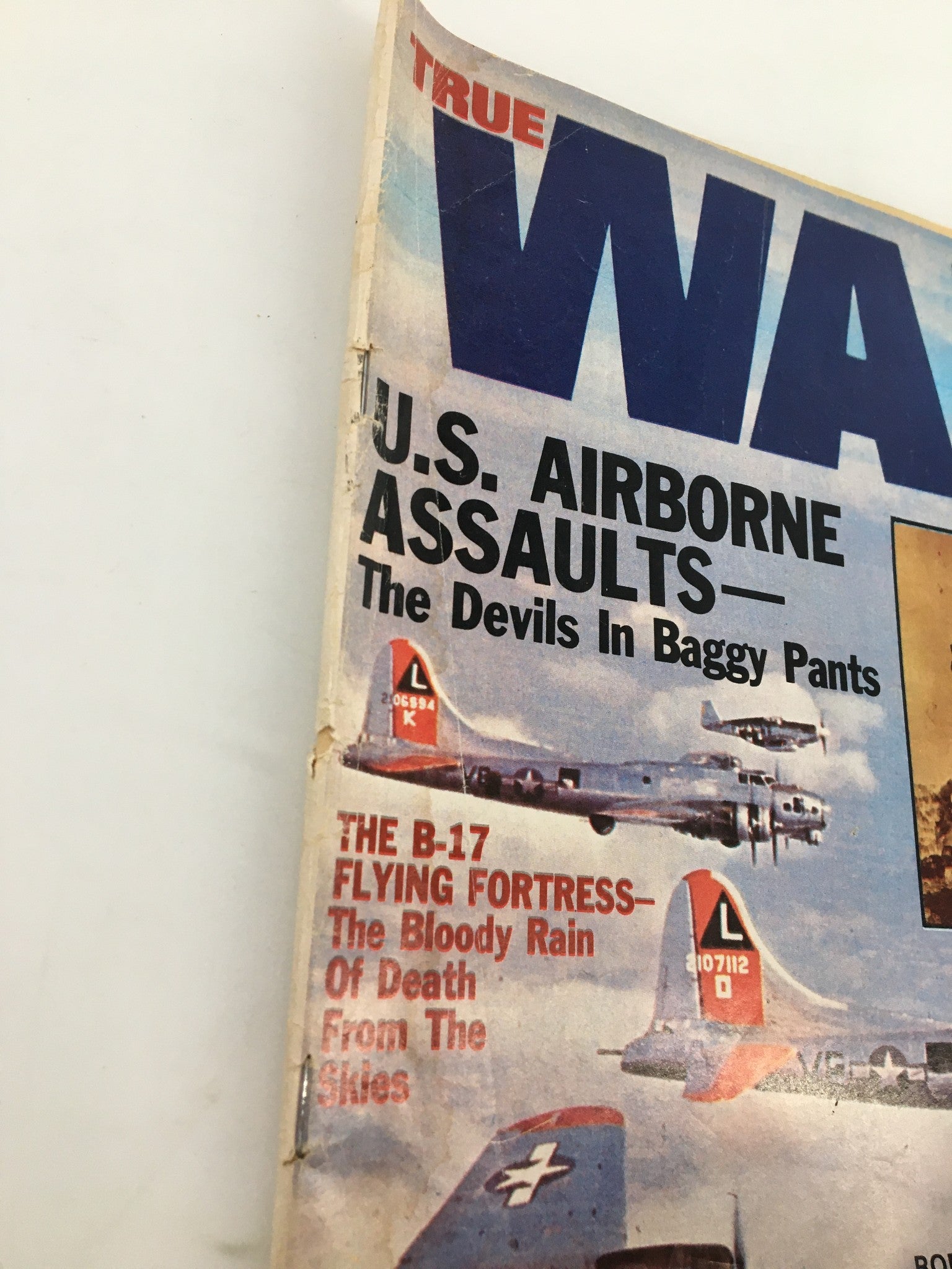 Side view of the VTG True War Magazine March 1976 showing the title and sections including 'The B-17 Flying Fortress' and military aircraft illustrations, enhancing its collectible value.