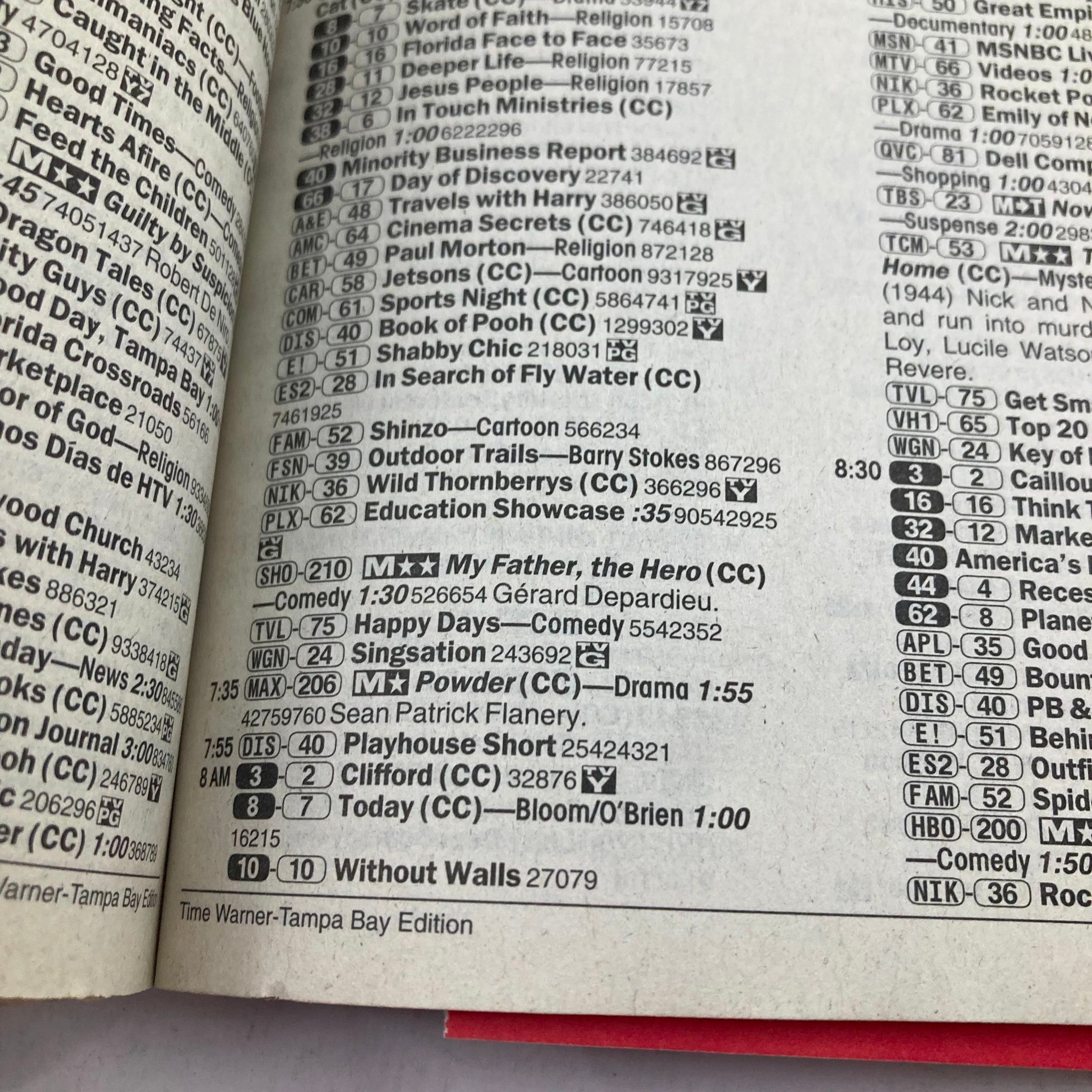 TV Guide Magazine August 17 2002 Elvis Presley - A page showcasing television listings from the Tampa Bay edition, capturing a nostalgic glimpse of early 2000s TV programming.