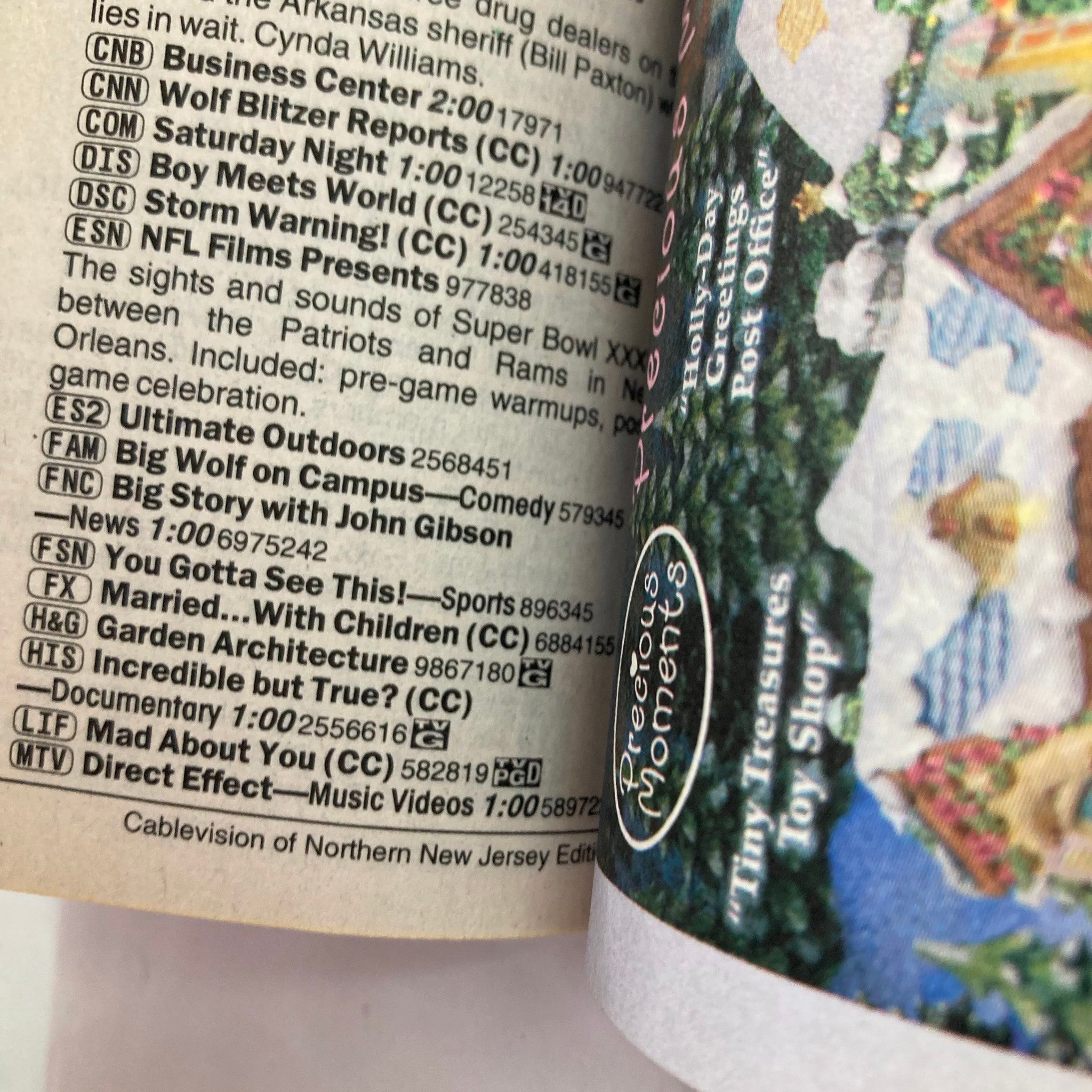 TV Guide Magazine August 17 2002 featuring listings from Cablevision of Northern NJ, showcasing programs like Ultimate Outdoors, Big Wolf on Campus, and Married... with Children. The magazine's inside pages display a curated selection of television content, ideal for collectors.