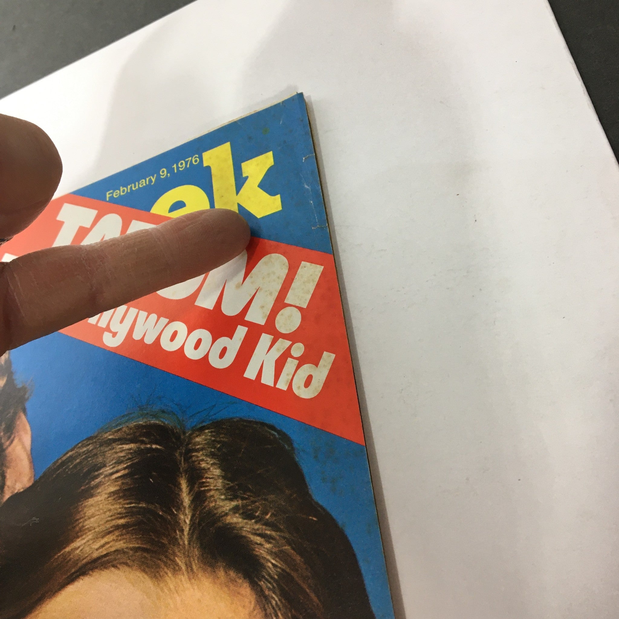 Side view of the February 9, 1976 Newsweek magazine, highlighting 'TATUM! The Hollywood Kid' with finger pointing to the title.