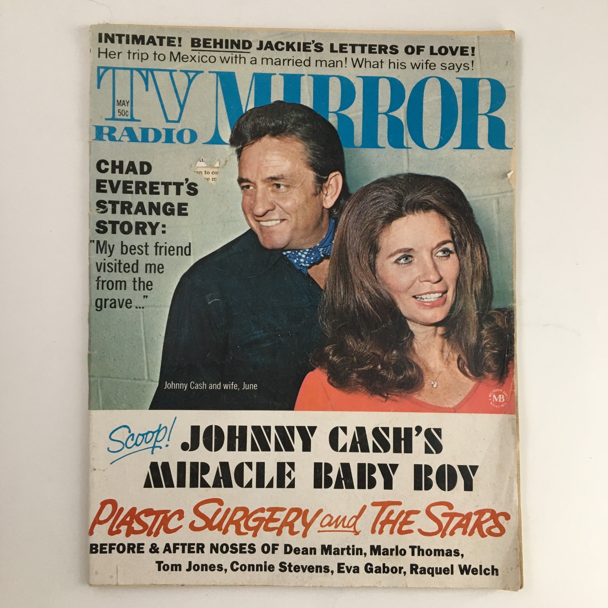 Cover of TV Radio Mirror Magazine May 1970 featuring Johnny Cash and June Carter Cash. The magazine showcases stories about country music legends with a vintage style.