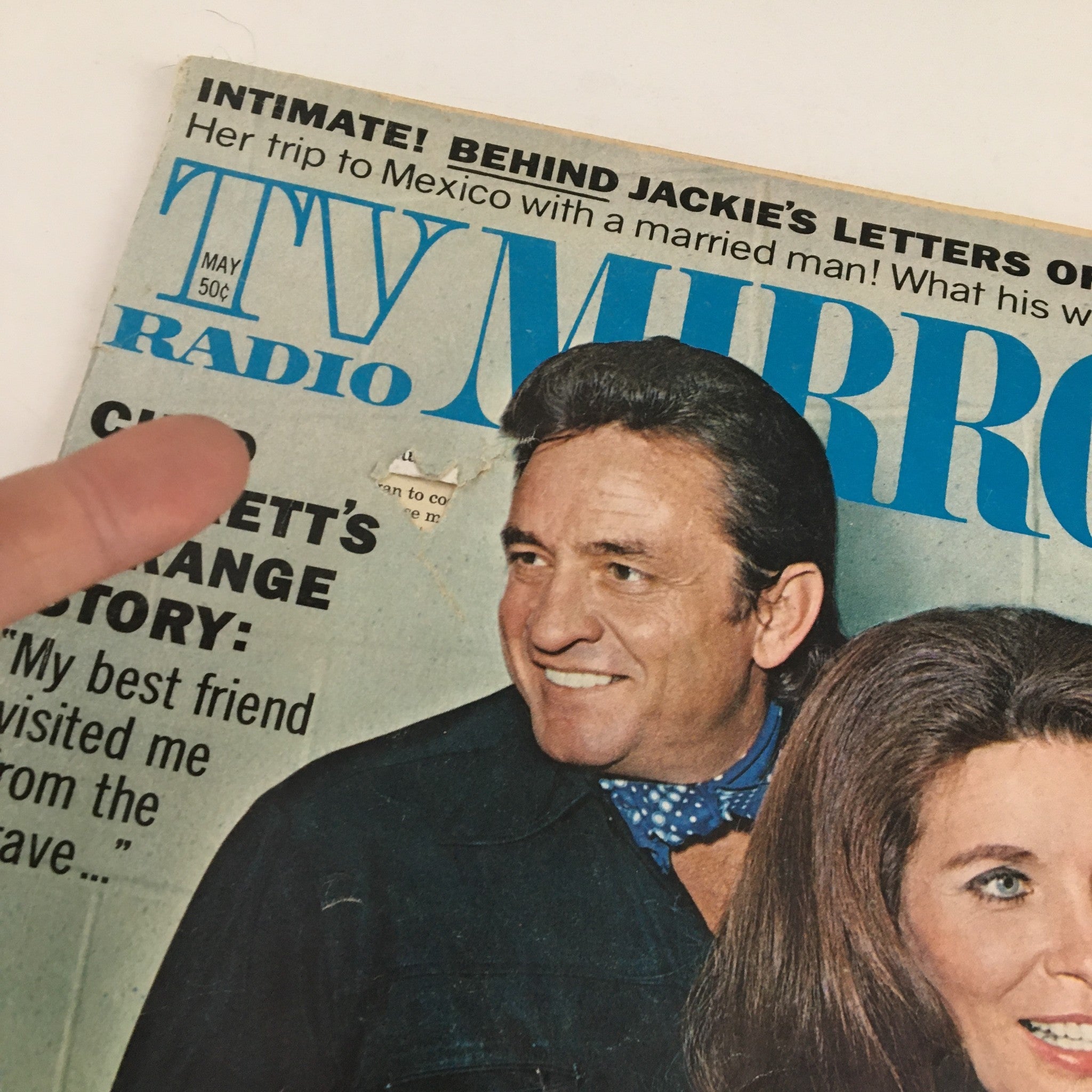 Close-up image of the TV Radio Mirror Magazine cover from May 1970, highlighting Johnny Cash's smile and June Carter Cash's elegant look.