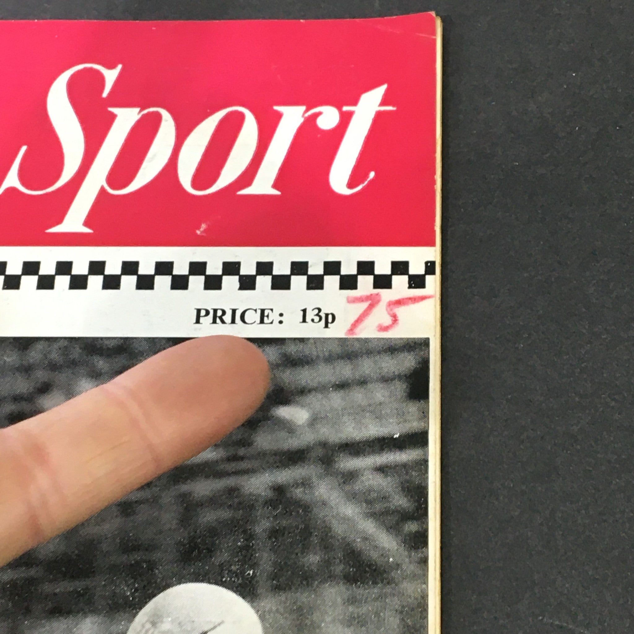 Close-up of the price section of the January 1973 Vintage Motorcycle Sport Magazine, indicating a price of 13p with a handwritten note of 75, emphasizing the magazine's collectible nature.