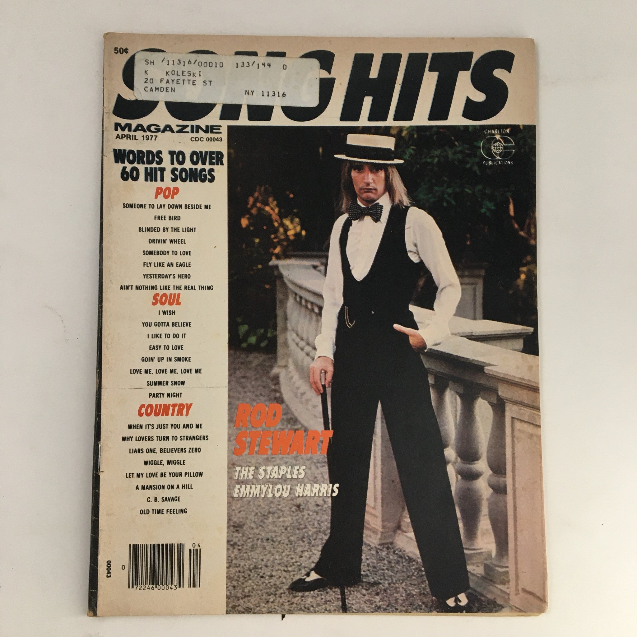 Cover of Song Hits Magazine April 1977 featuring Rod Stewart, The Staples, and Emmylou Harris, showcasing music history from the late '70s.