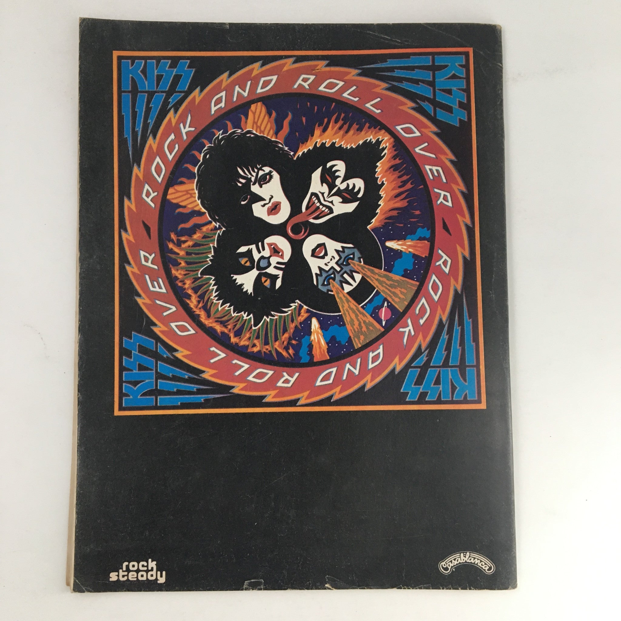 Cover of Song Hits Magazine April 1977 featuring Rod Stewart, The Staples, and Emmylou Harris with vibrant colors and music-themed design.