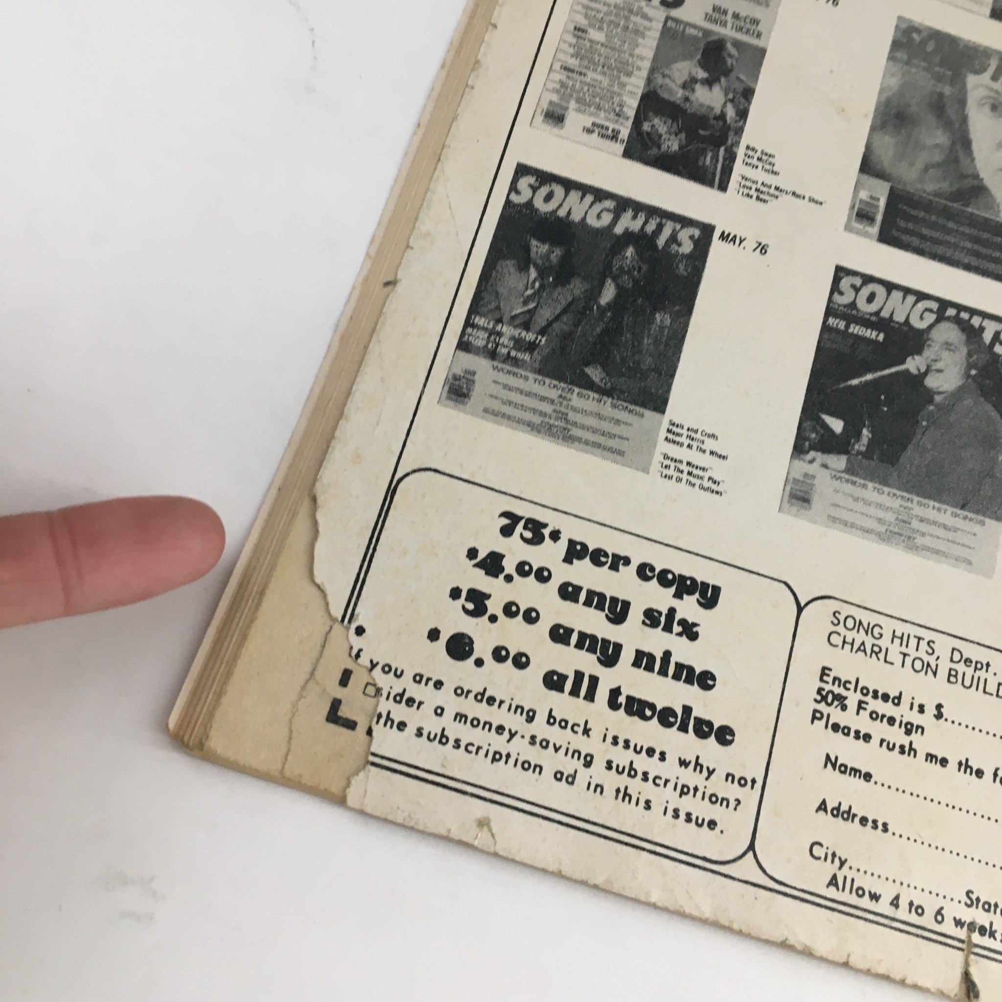 Close-up image of the back cover of Song Hits Magazine August 1977 highlighting subscription details and offers for back issues of the magazine.