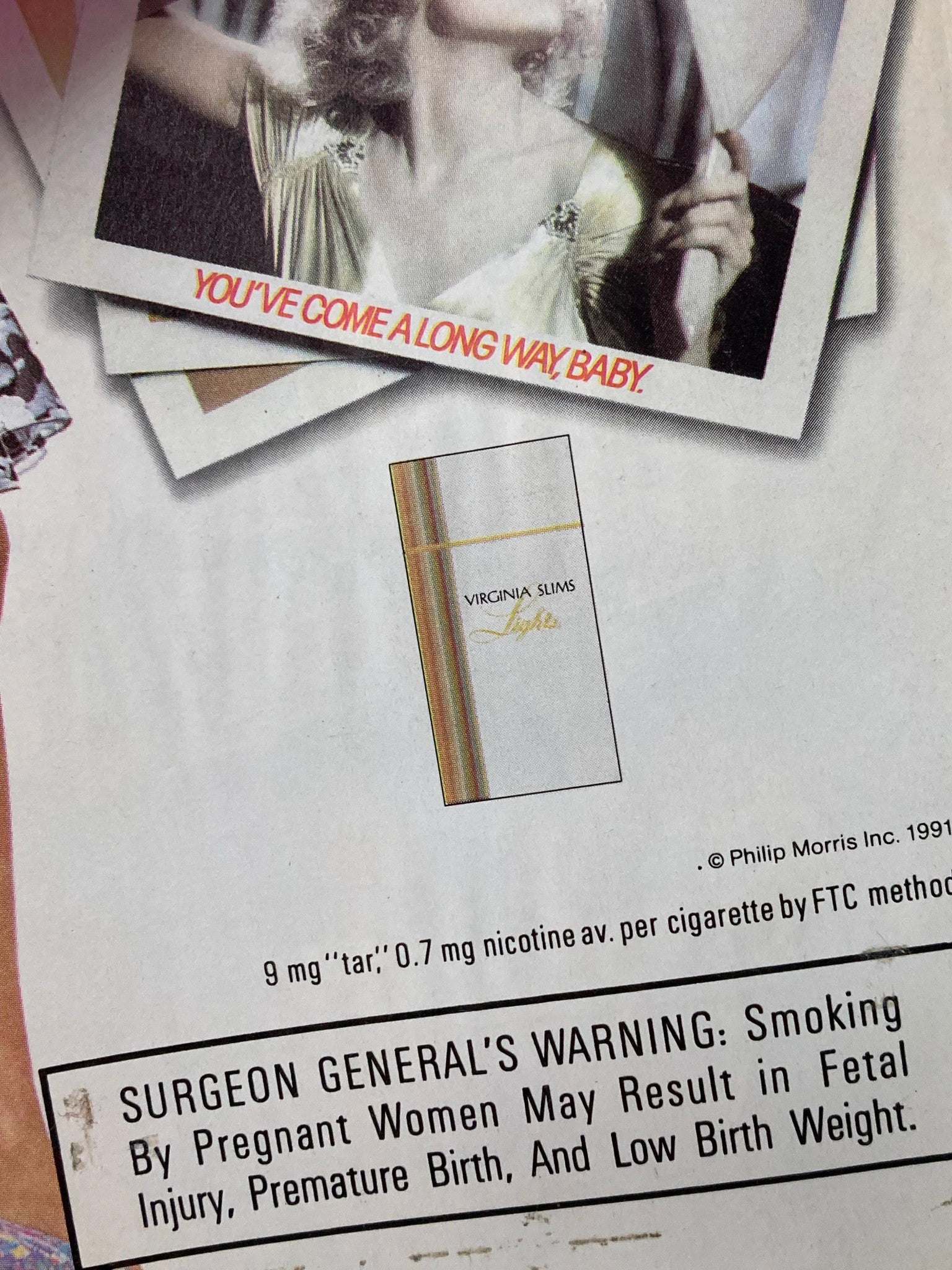Advertisement for Virginia Slims cigarettes featuring a vintage design and health warning, illustrating marketing techniques used in the early 1990s.