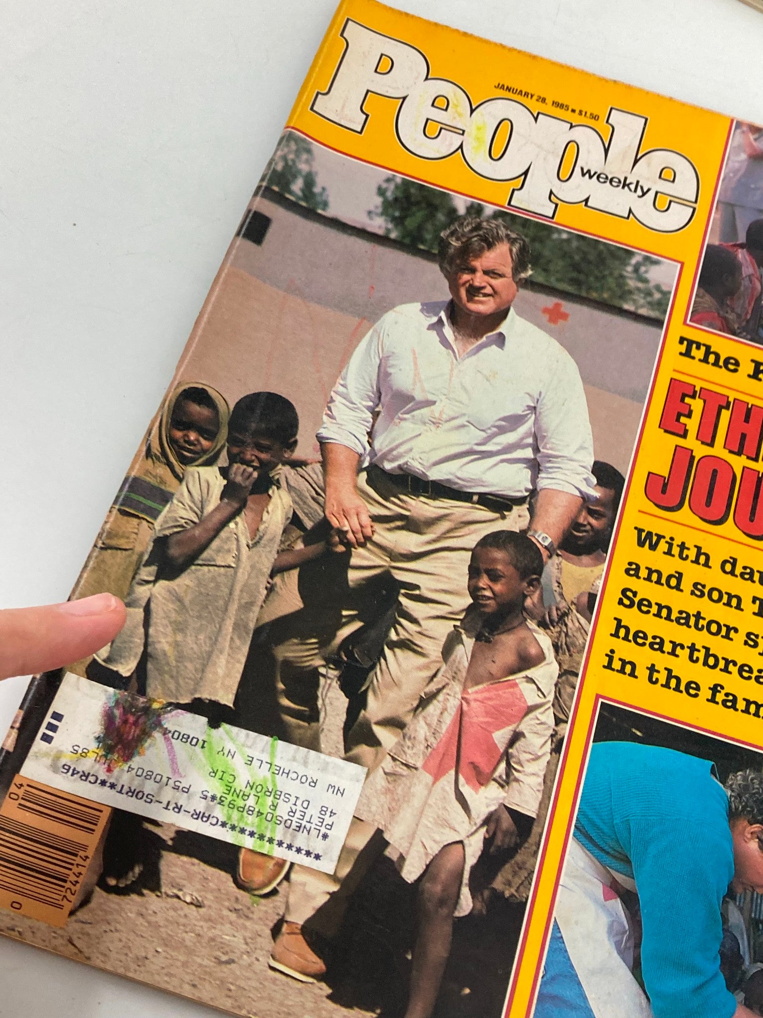 Close-up of the cover of VTG People Weekly Magazine dated January 28, 1985, showcasing Ted Kennedy surrounded by children in Ethiopia, emphasizing the humanitarian aspect of their visit.