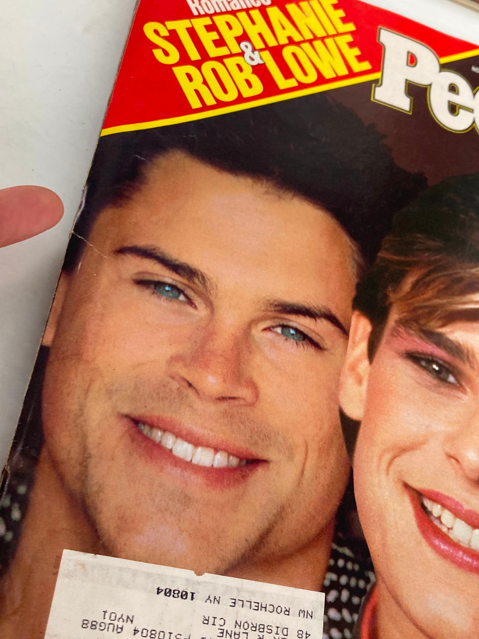 Cover image of the vintage People Weekly Magazine from November 10, 1986, featuring Rob Lowe with a charming smile. The magazine highlights stories of Hollywood and pop culture, emphasizing the celebrity romance of Rob Lowe and Princess Stephanie.
