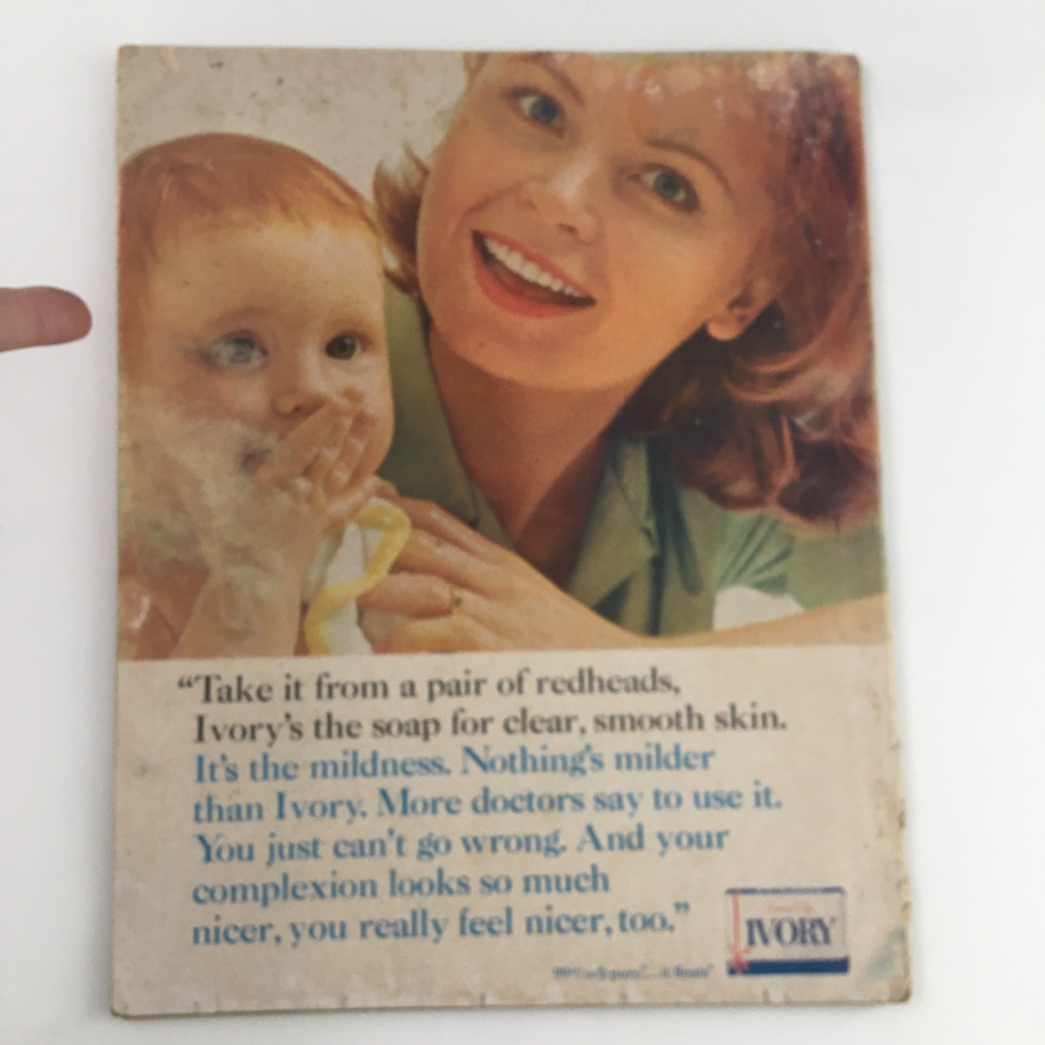 Back cover of Photoplay Magazine March 1964 featuring an advertisement for Ivory soap with a mother and child, capturing the nostalgic feel of 1960s marketing.