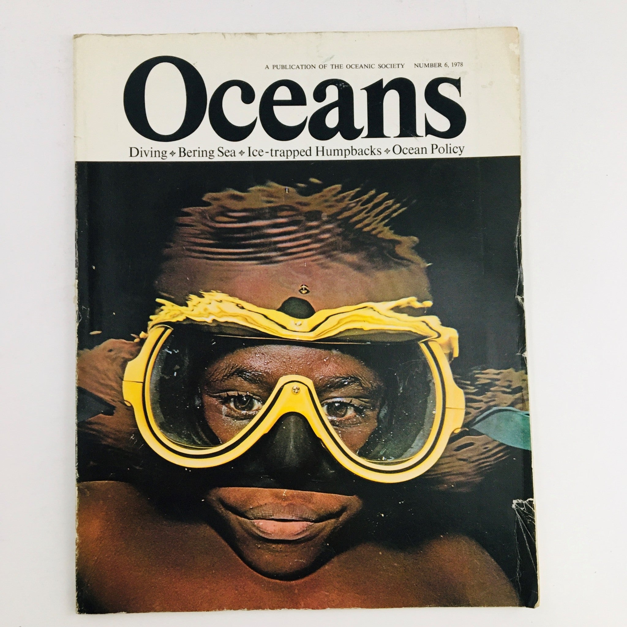 Cover of Oceans Magazine November 1978 Vol 11 No. 6 featuring a diver with a yellow snorkel mask submerged in water, emphasizing marine exploration and conservation.