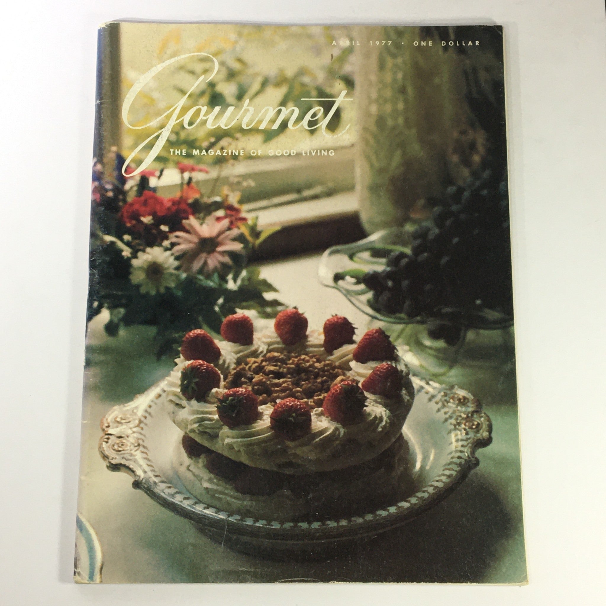 Cover of VTG Gourmet Magazine from April 1977 featuring a delicious dessert with raspberries and a floral backdrop, highlighting Sephardic Cookery.