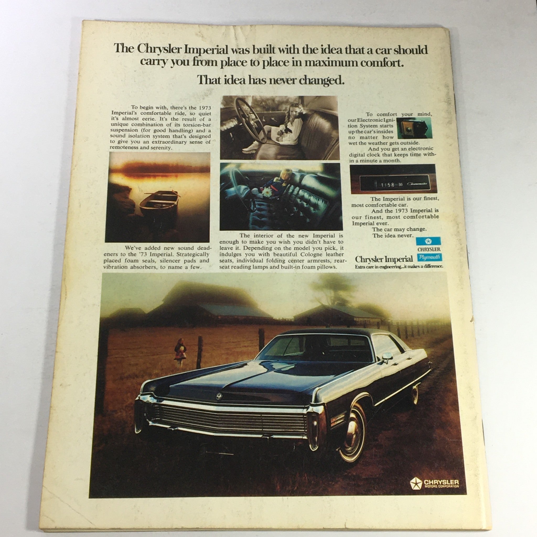Vintage advertisement featuring the Chrysler Imperial, showcasing its luxurious features and comfort. The ad emphasizes the car's design and interior amenities, illustrating the model's elegance and style. Captured in a serene landscape, this image highlights the Chrysler Imperial from the October 1972 issue of VTG Gourmet The Magazine of Good Living.