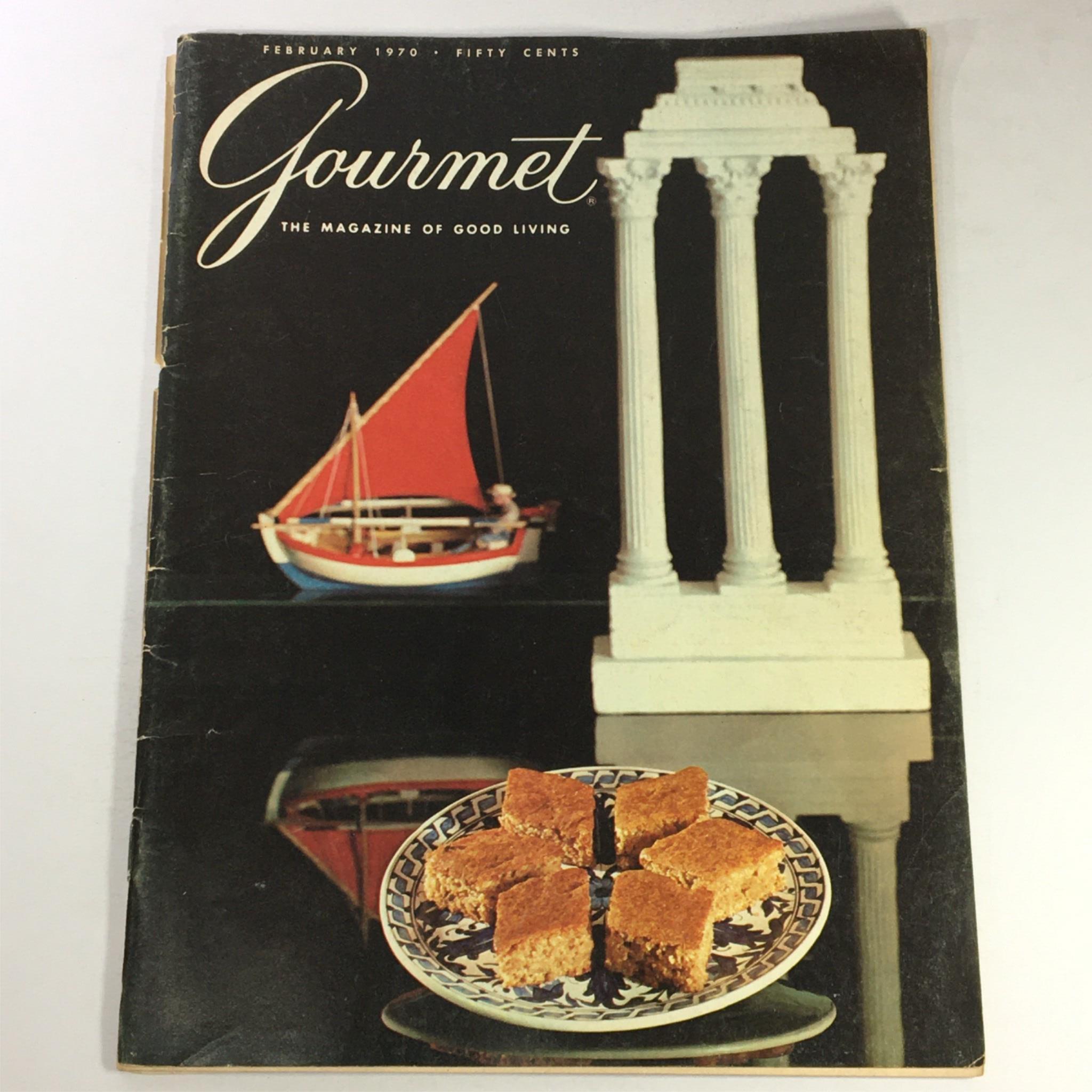 Cover of VTG Gourmet The Magazine of Good Living February 1970 featuring a decorative plate with dessert, a model sailboat, and classical columns, illustrating the theme 'London at Table'.