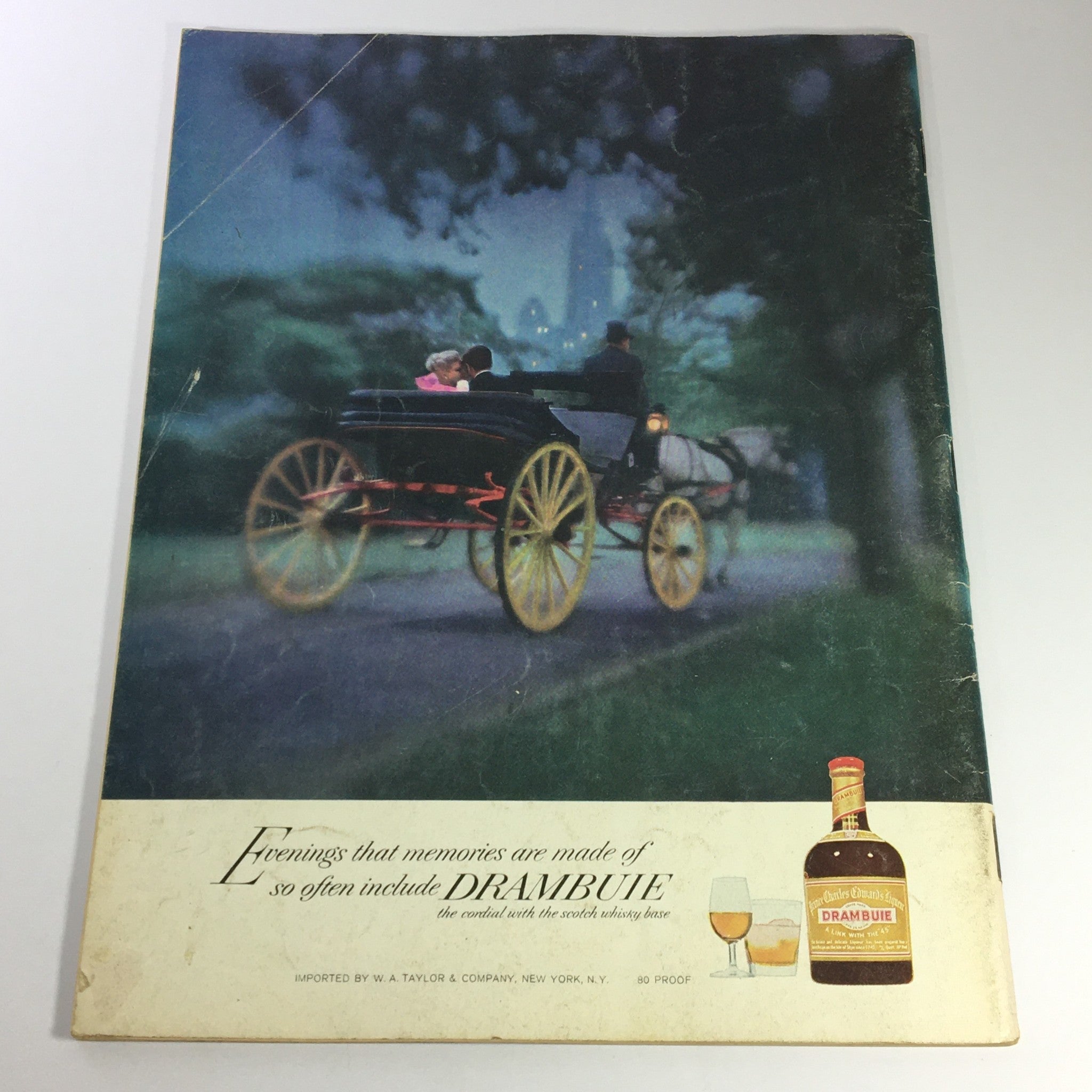 Back cover of VTG Gourmet Magazine, September 1970, depicting a romantic horse-drawn carriage evening scene, promoting Drambuie liqueur.