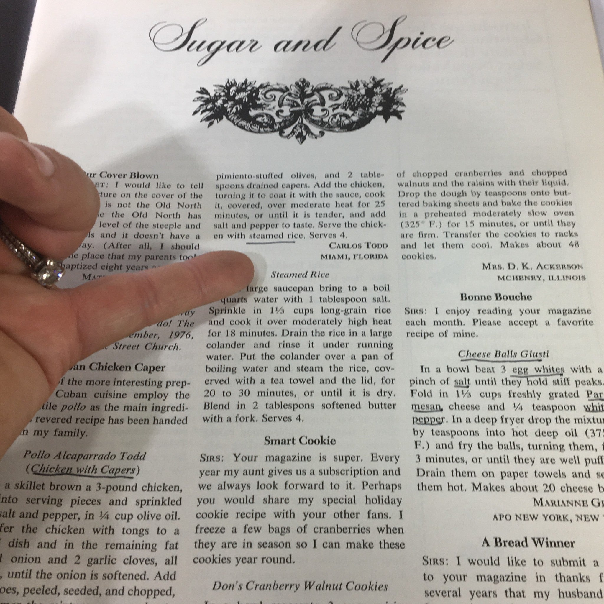 Page from VTG Gourmet Magazine February 1977 displaying recipes including Steamed Rice and Smart Cookie, highlighted by a finger pointing at the text.