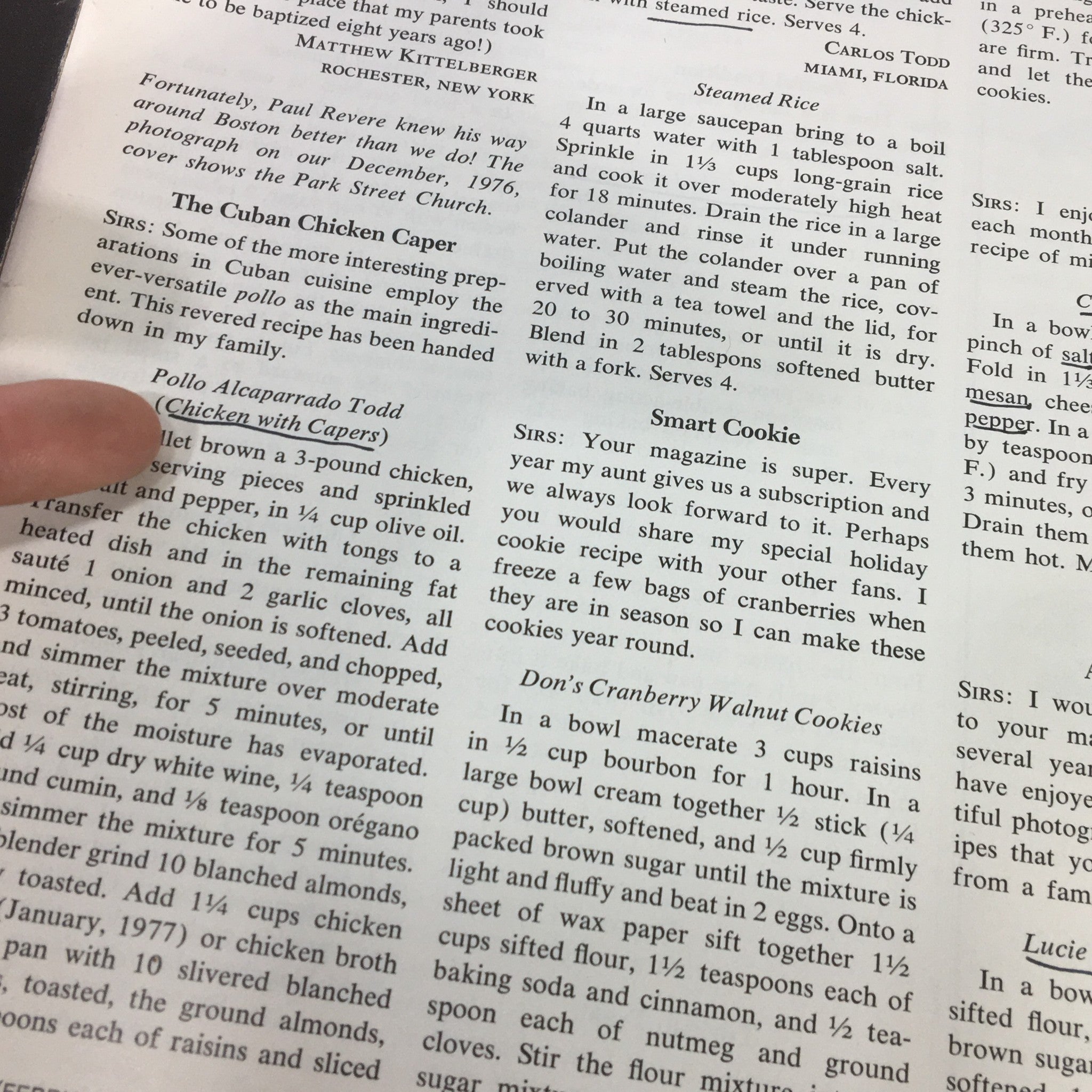 Detailed view of a recipe titled 'Pollo Alcaparrado Todad (Chicken with Capers)' in the VTG Gourmet Magazine February 1977, with a finger indicating the instructions.