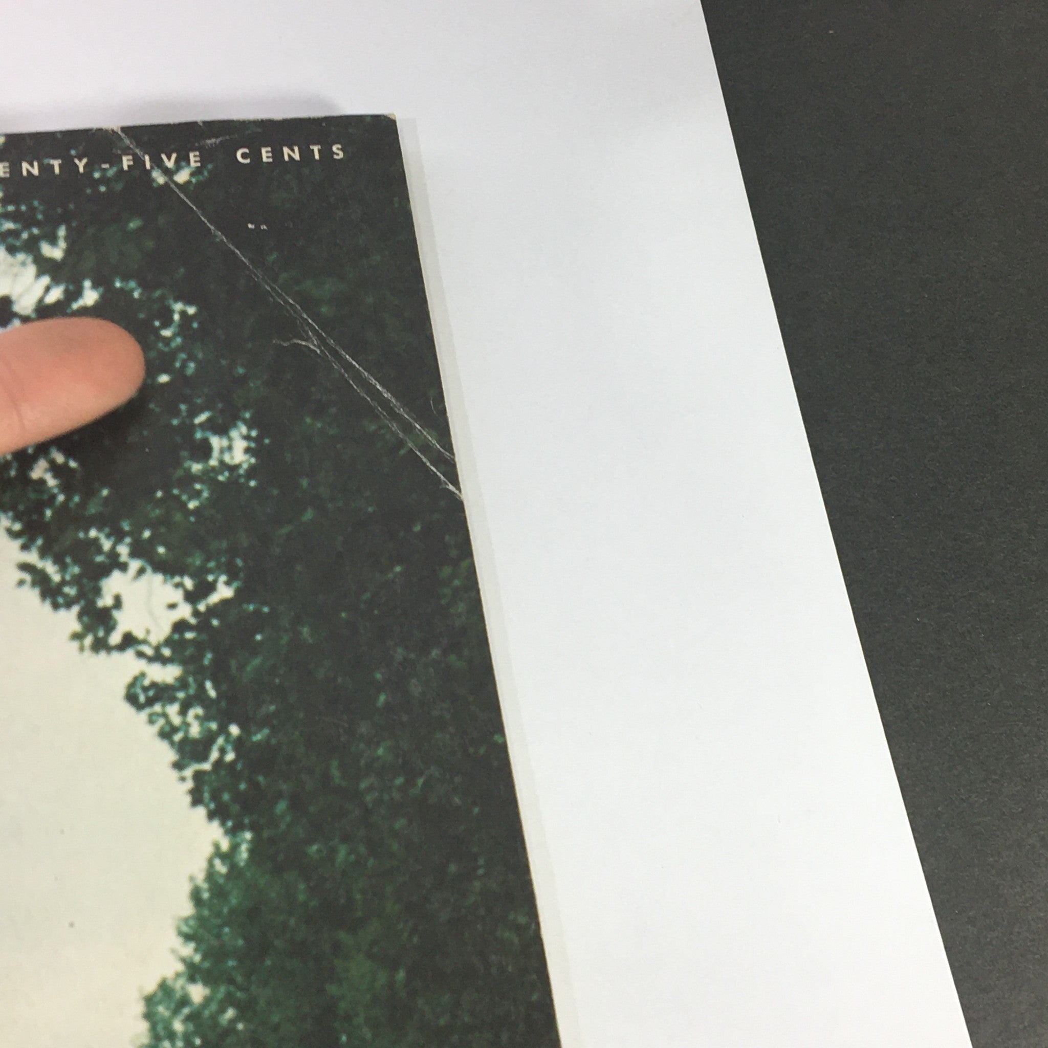 Side view of the VTG Gourmet Magazine - May 1974 Issue showing minor wear and edges, highlighting its vintage condition.