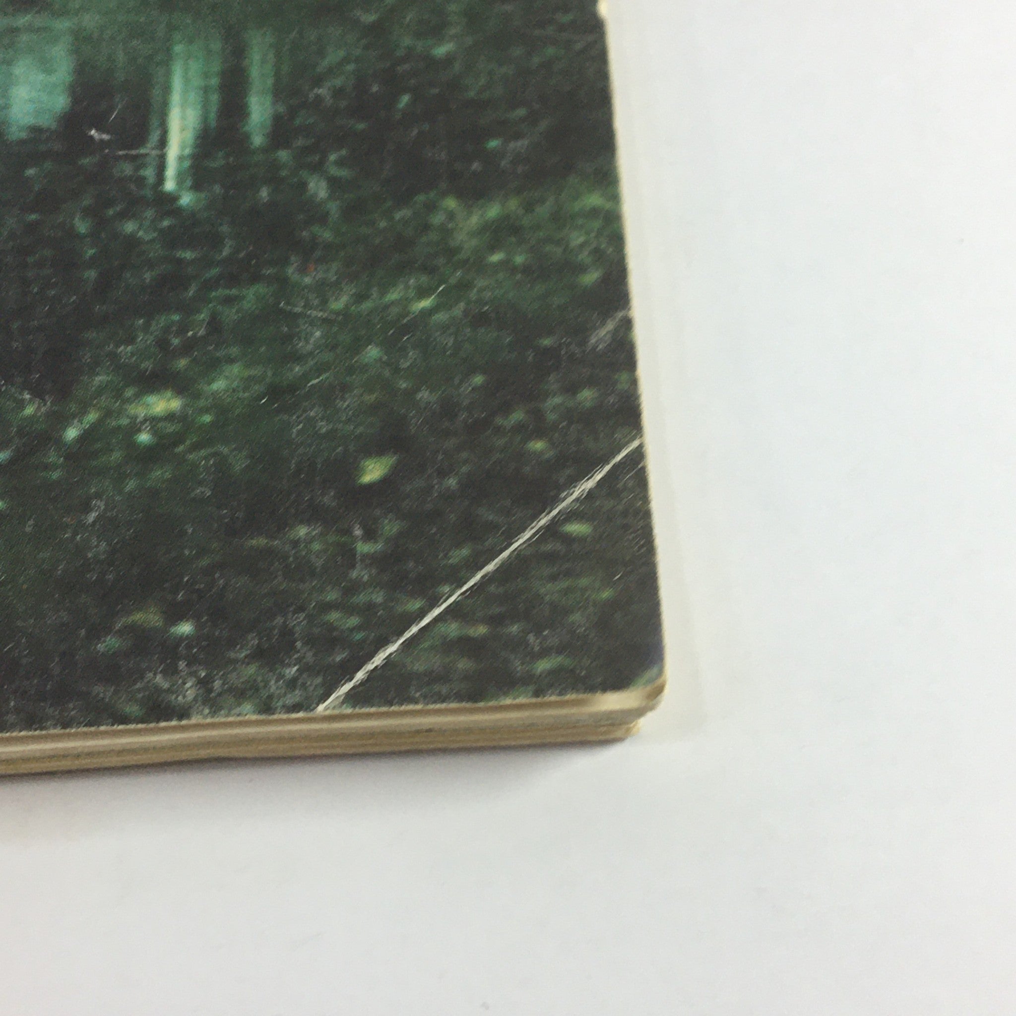 Bottom edge view of VTG Gourmet Magazine - May 1974 Issue displaying wear and age, emphasizing its collectible status.