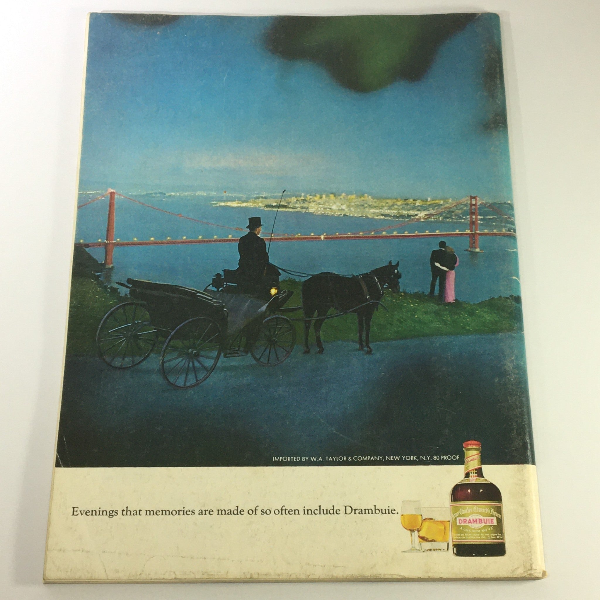 Back cover of VTG Gourmet Magazine - May 1974 Issue featuring an advertisement for Drambuie, showcasing a scenic background of a city.